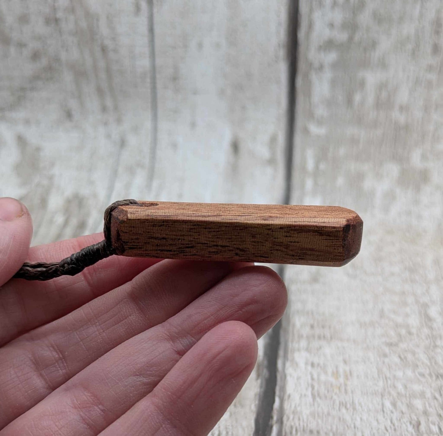 Sapele mahogany wood roimata pendant.