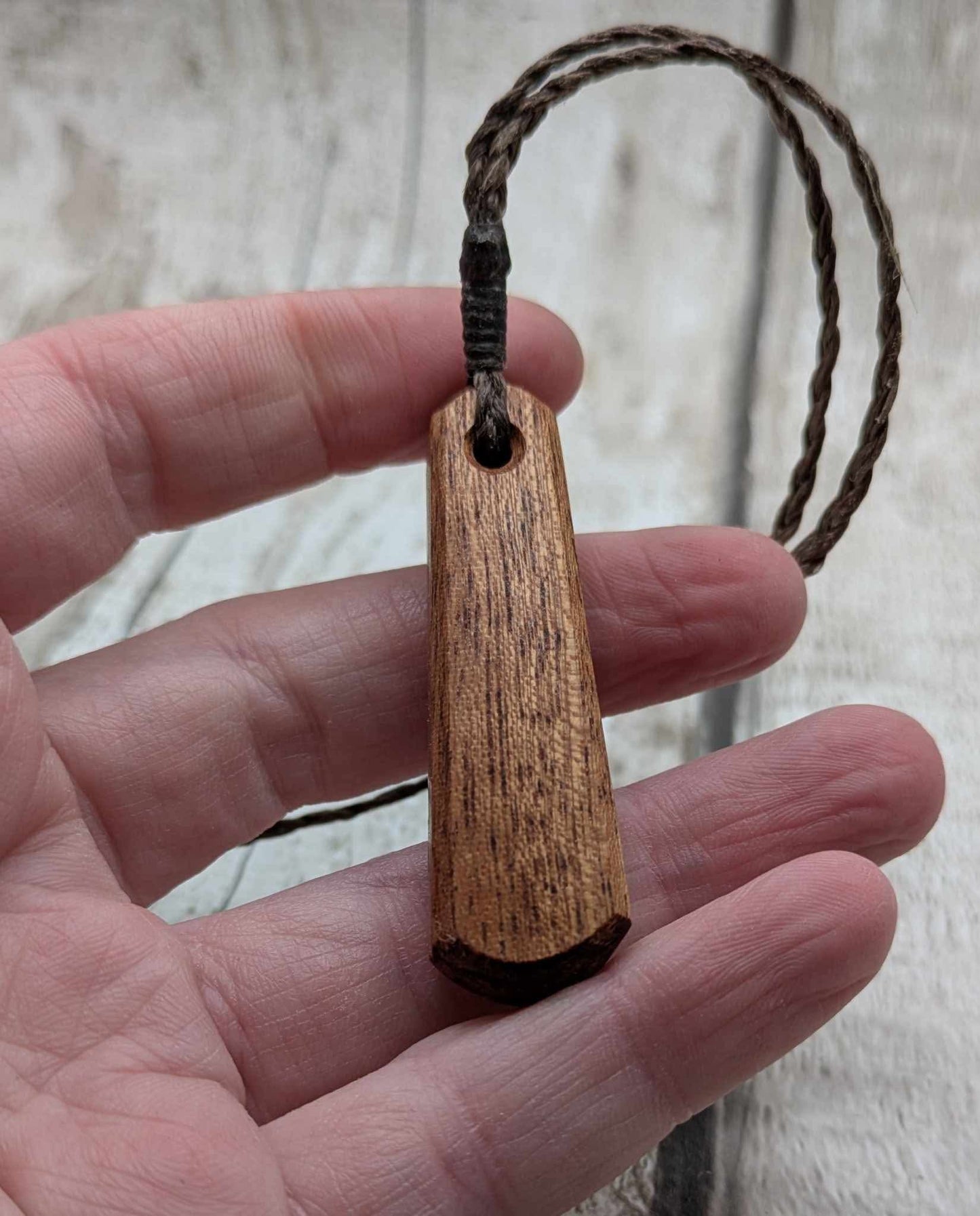 Sapele mahogany wood roimata pendant.