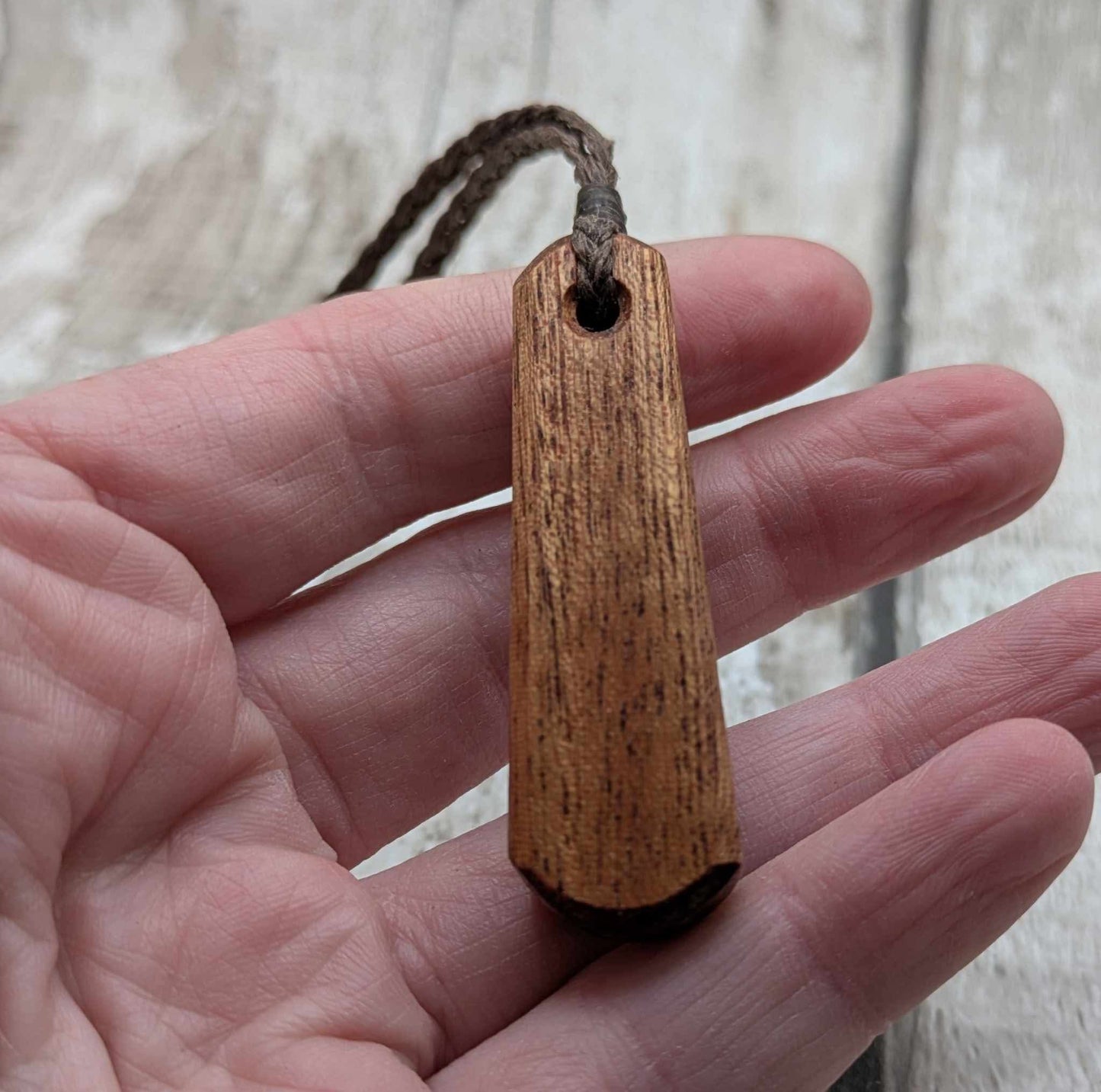 Sapele mahogany wood roimata pendant.