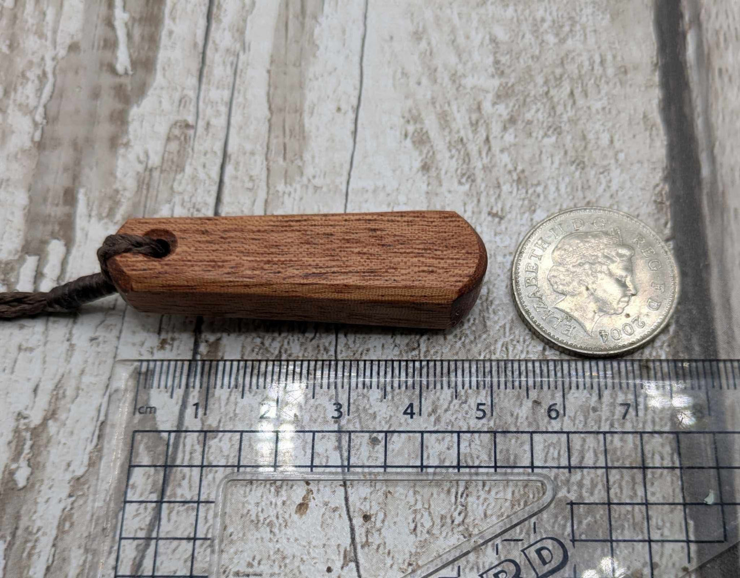 Sapele mahogany wood roimata pendant.