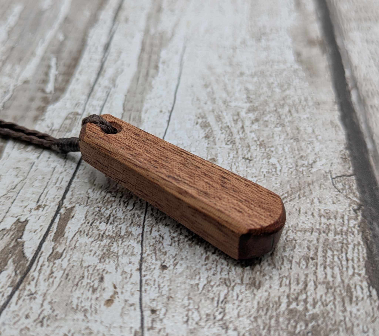 Sapele mahogany wood roimata pendant.