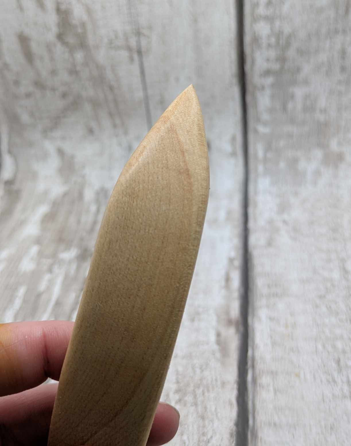 Ash wood curved hair stick with man made Opal charm.