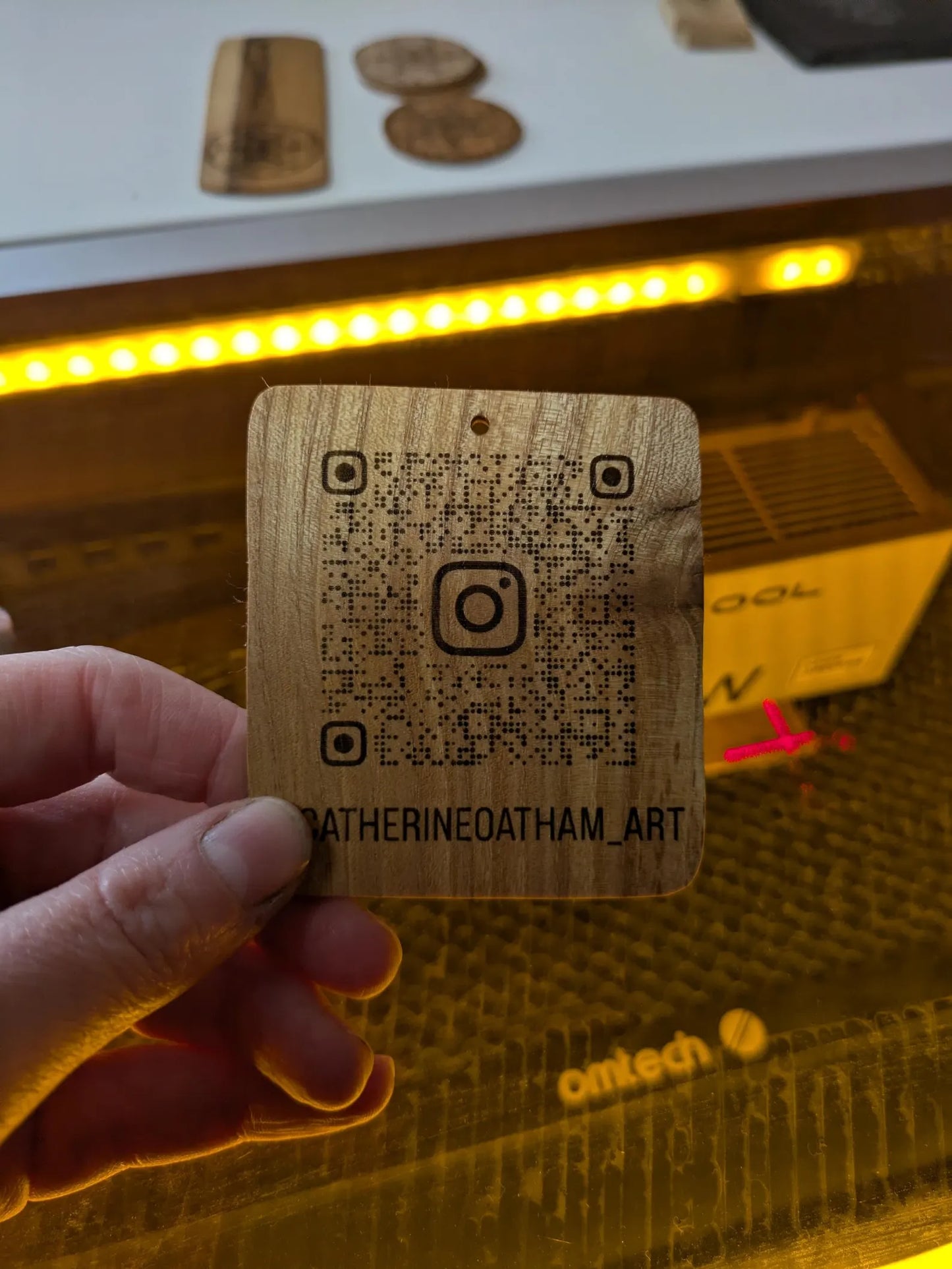 Custom QR code laser printing on reclaimed wood.