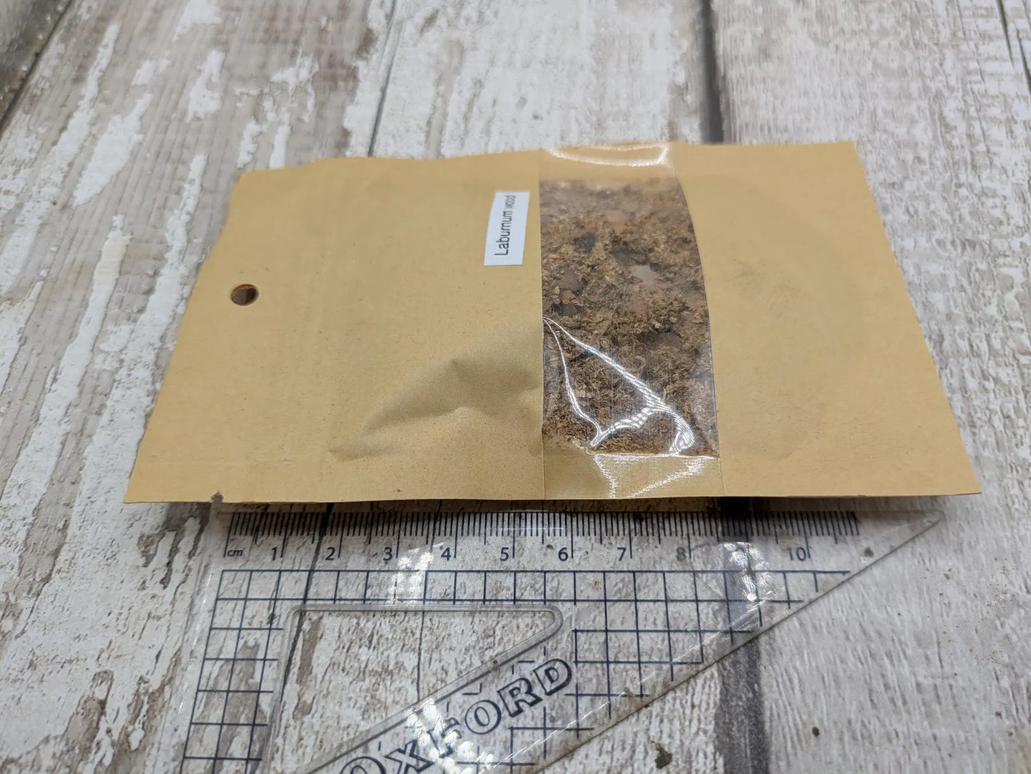 Laburnum wood sawdust pouch.