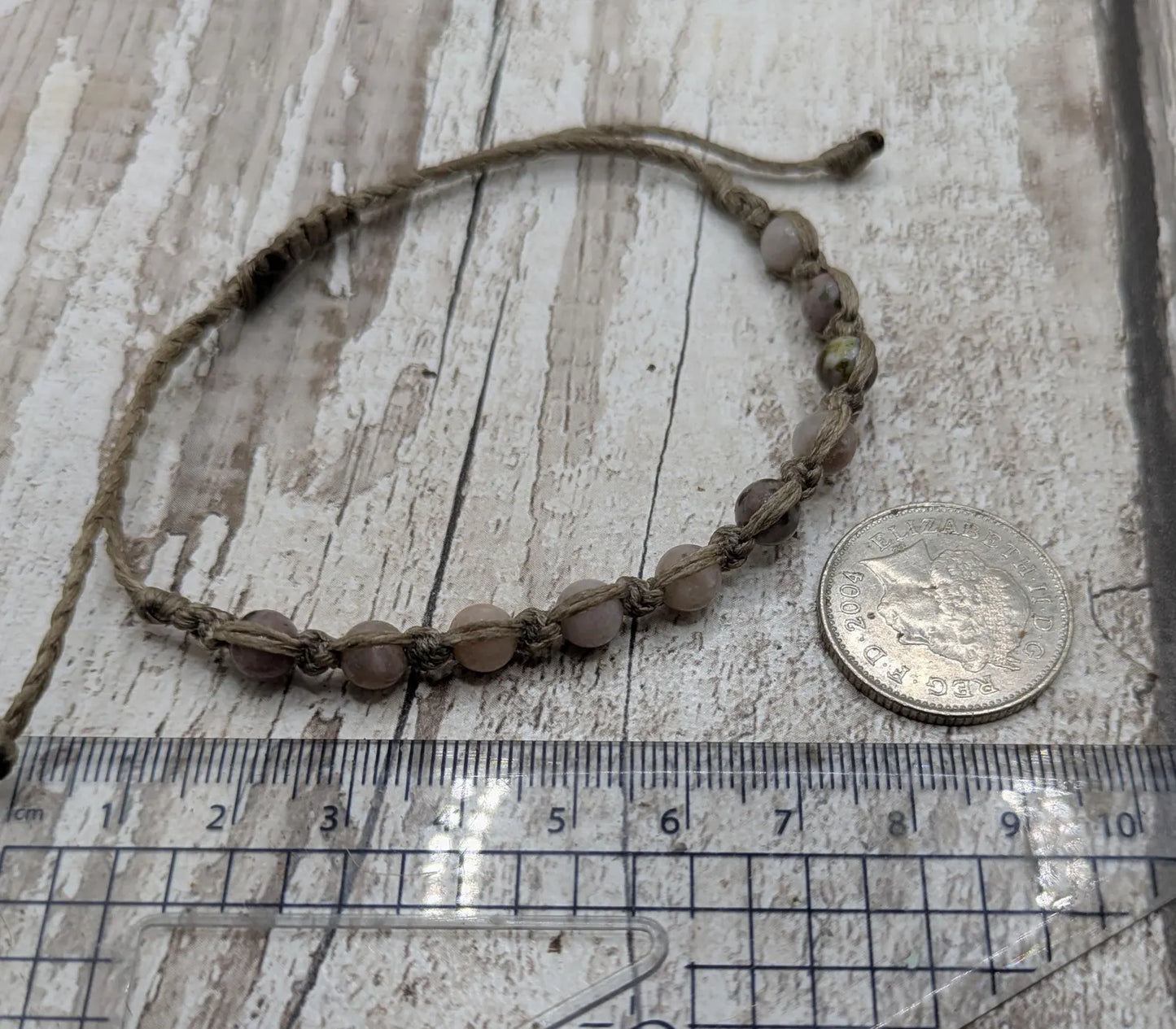 Light lepidolite beaded macramé bracelet.