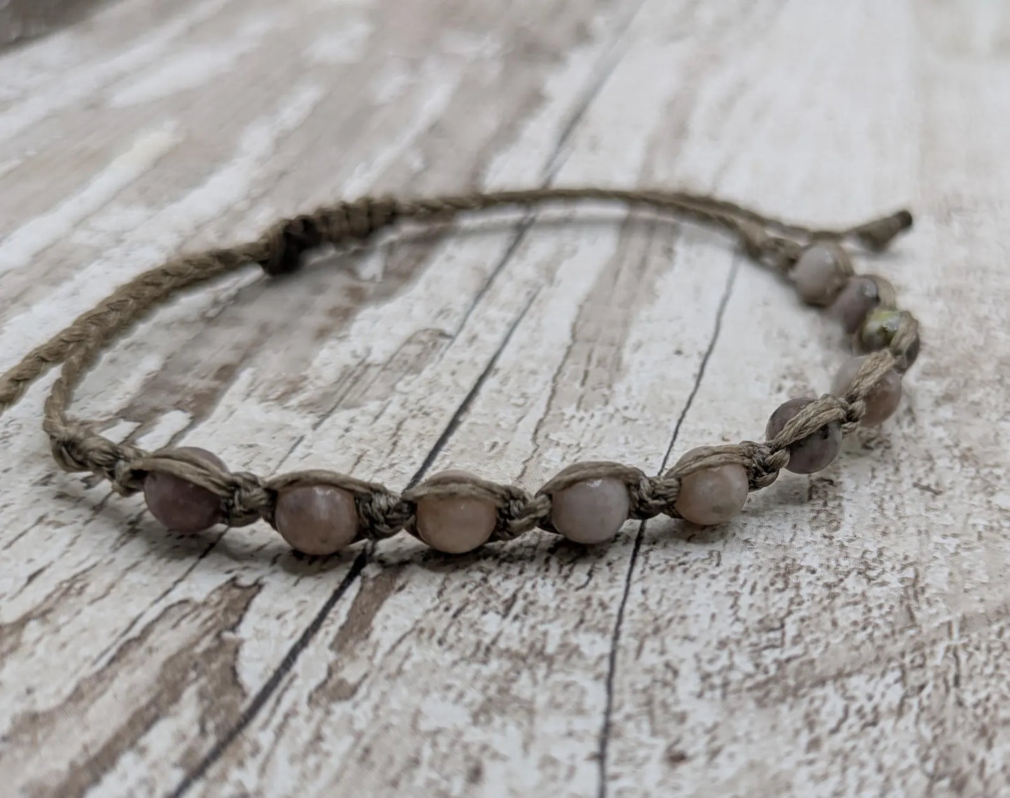 Light lepidolite beaded macramé bracelet.