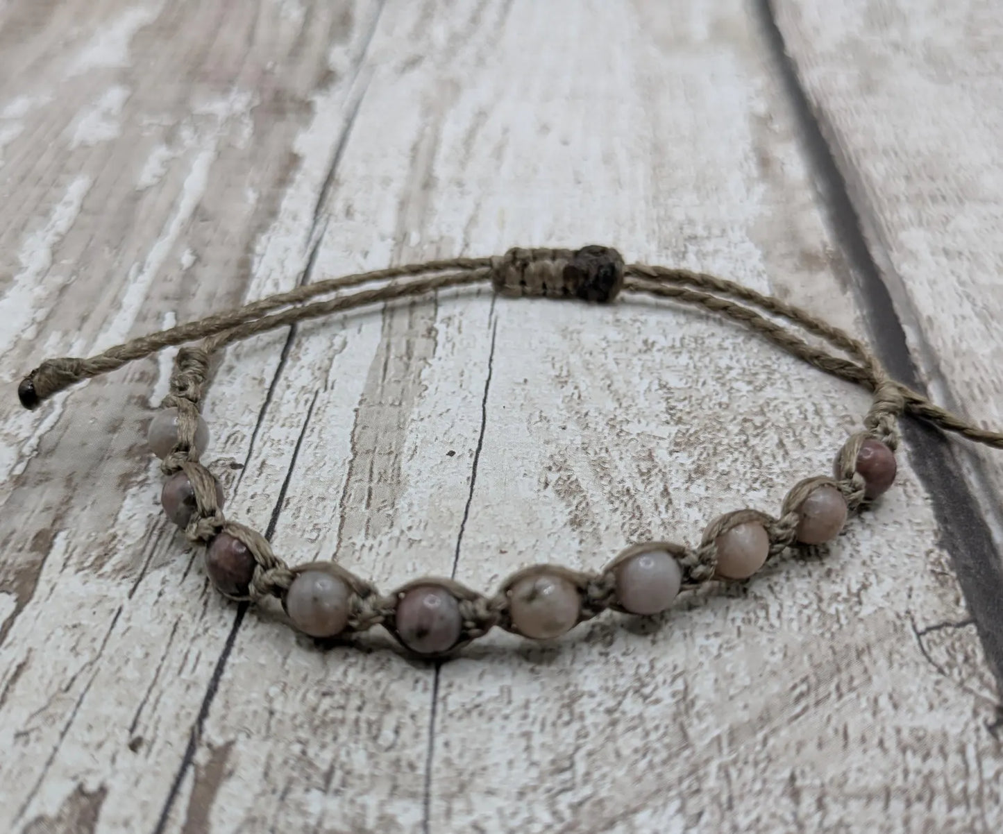 Light lepidolite beaded macramé bracelet.