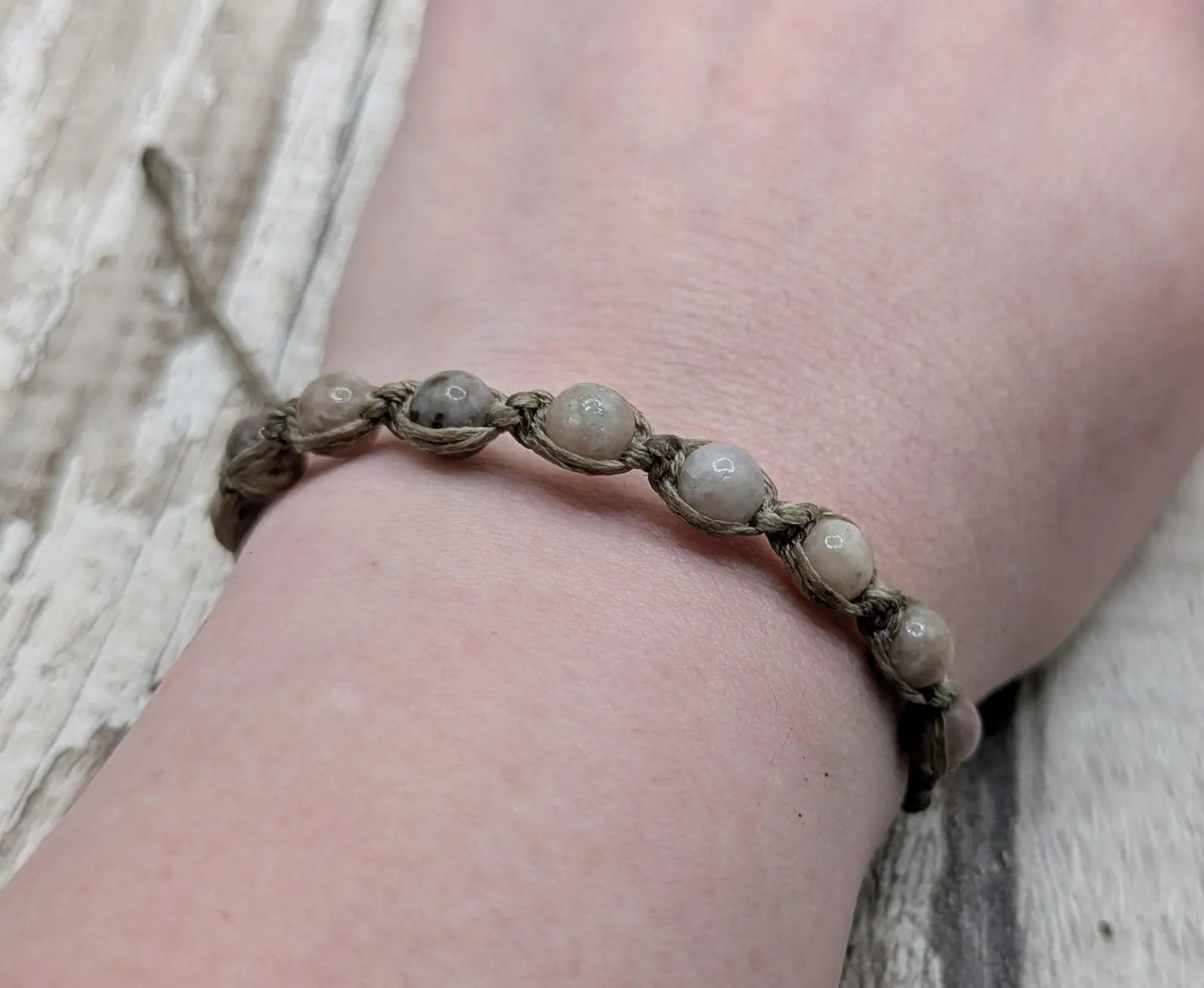 Light lepidolite beaded macramé bracelet.