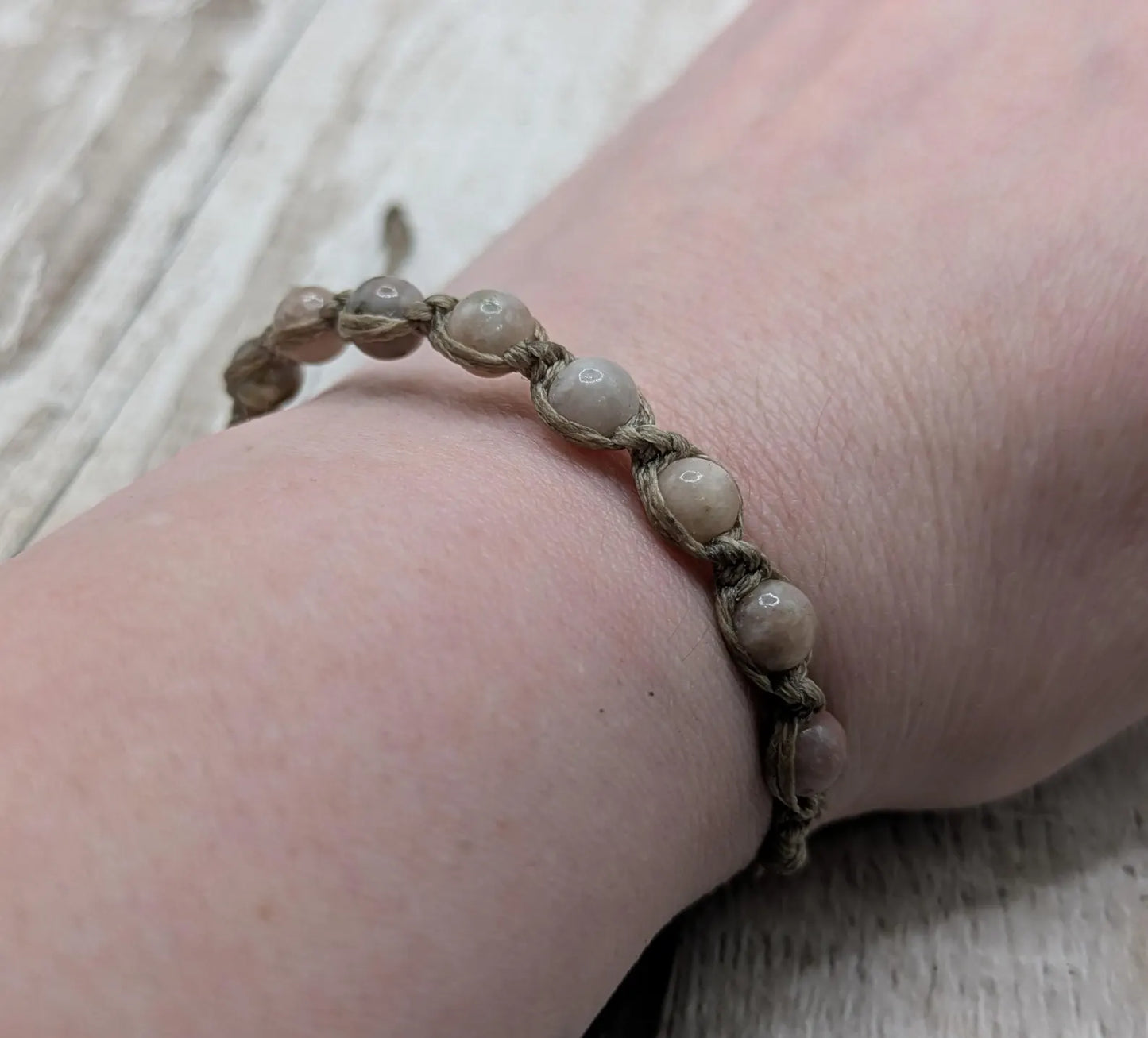 Light lepidolite beaded macramé bracelet.