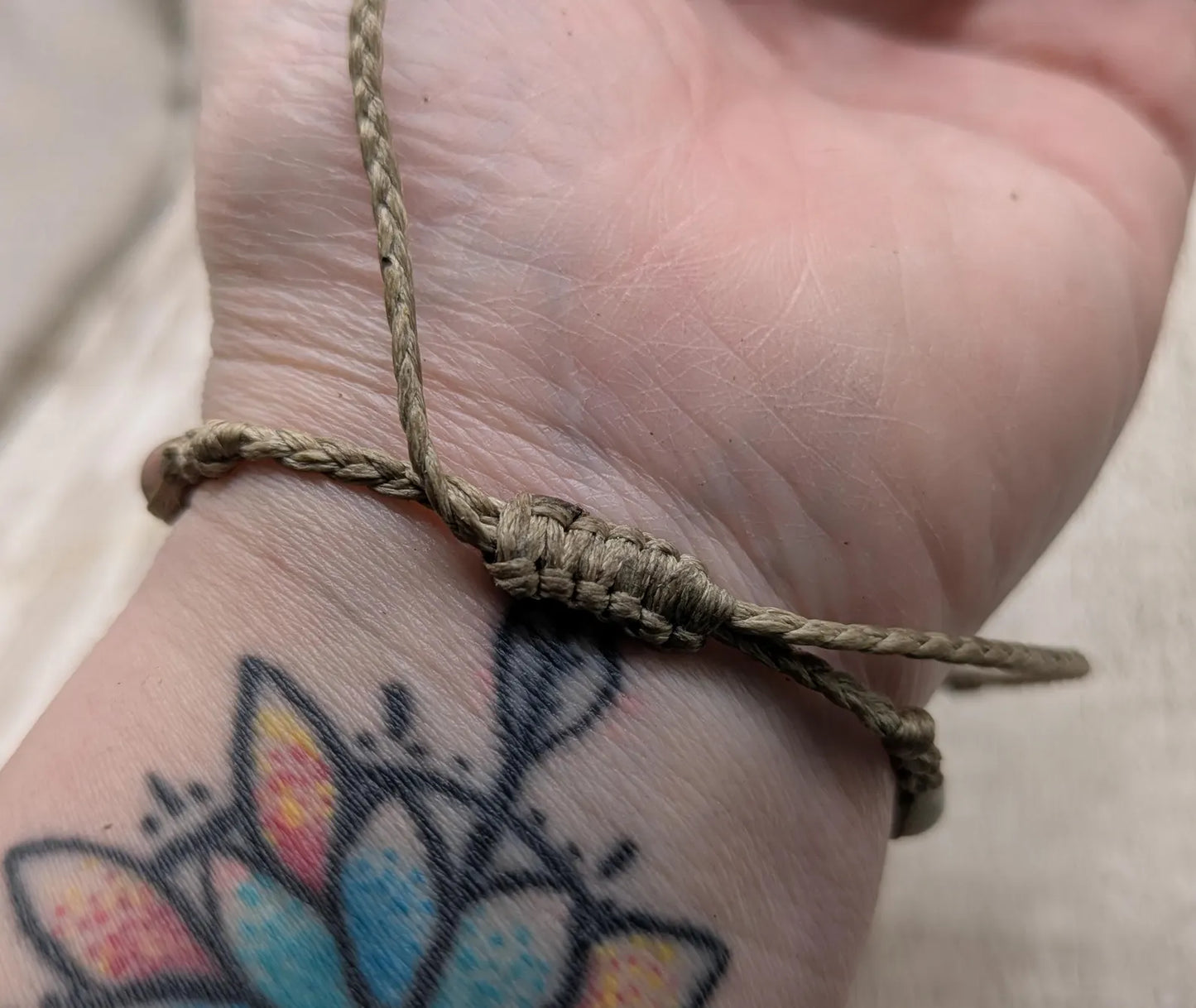 Light lepidolite beaded macramé bracelet.