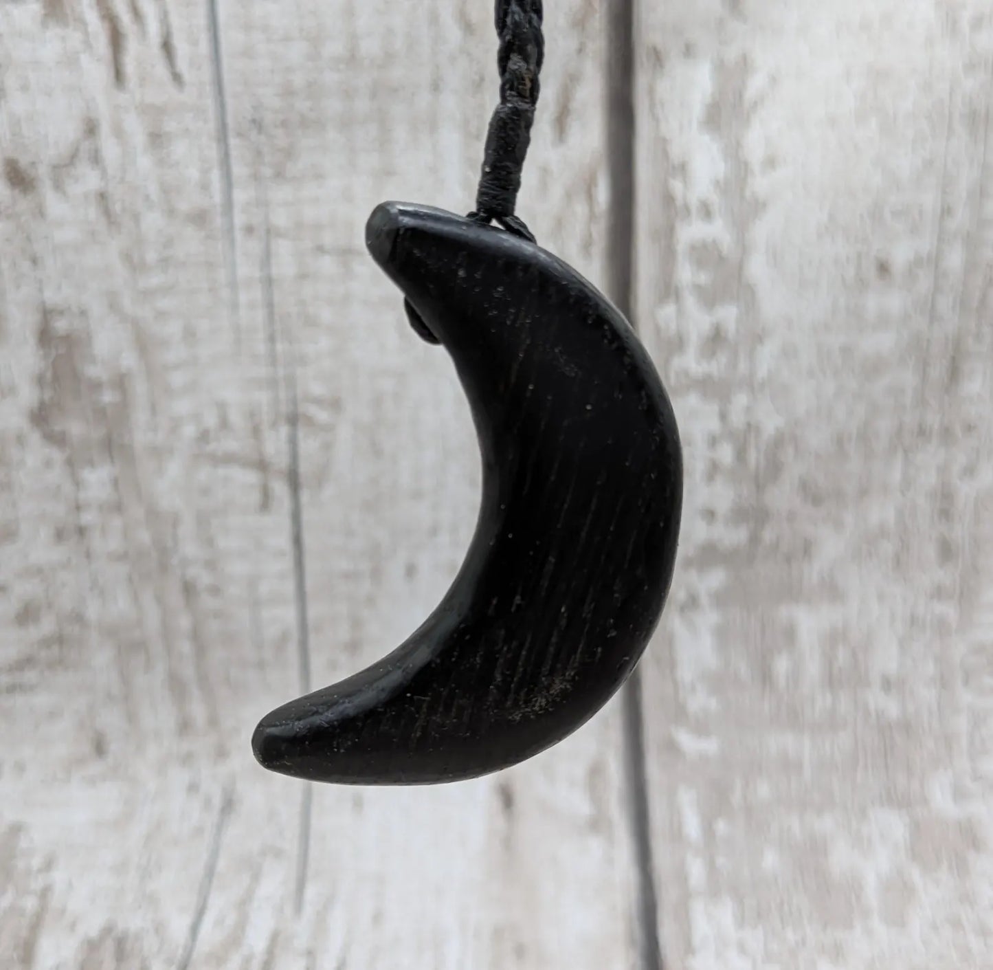 Made to order fenland bog oak crescent moon pendant.