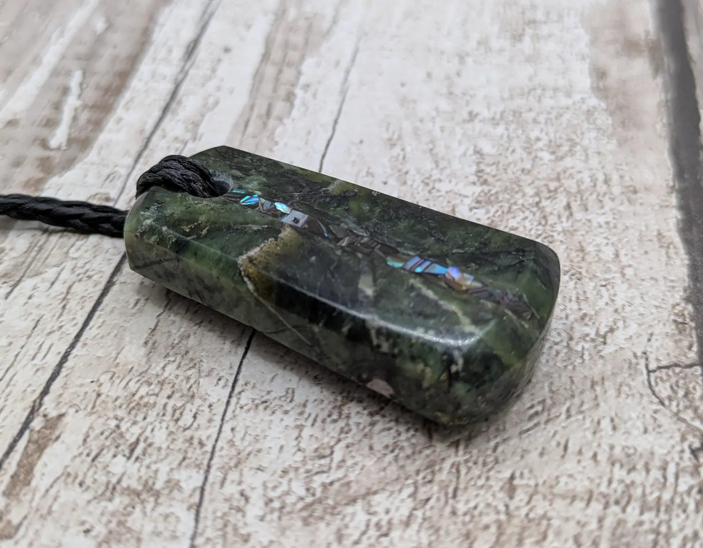 Haast pass serpentine pendant with Pāua shell- handcrafted New Zealand Aotearoa pounamu greenstone carved pendant.
