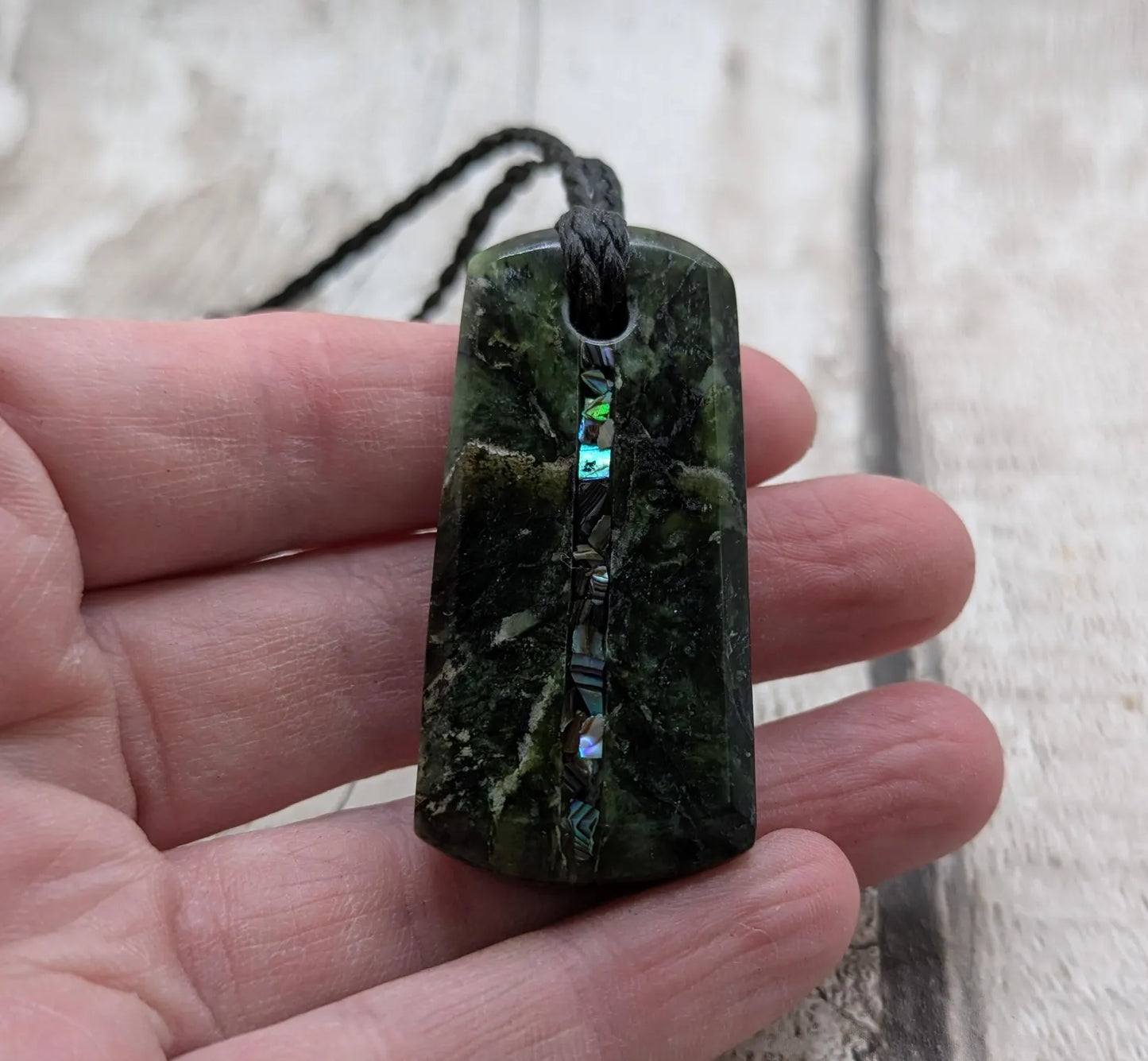 Haast pass serpentine pendant with Pāua shell- handcrafted New Zealand Aotearoa pounamu greenstone carved pendant.