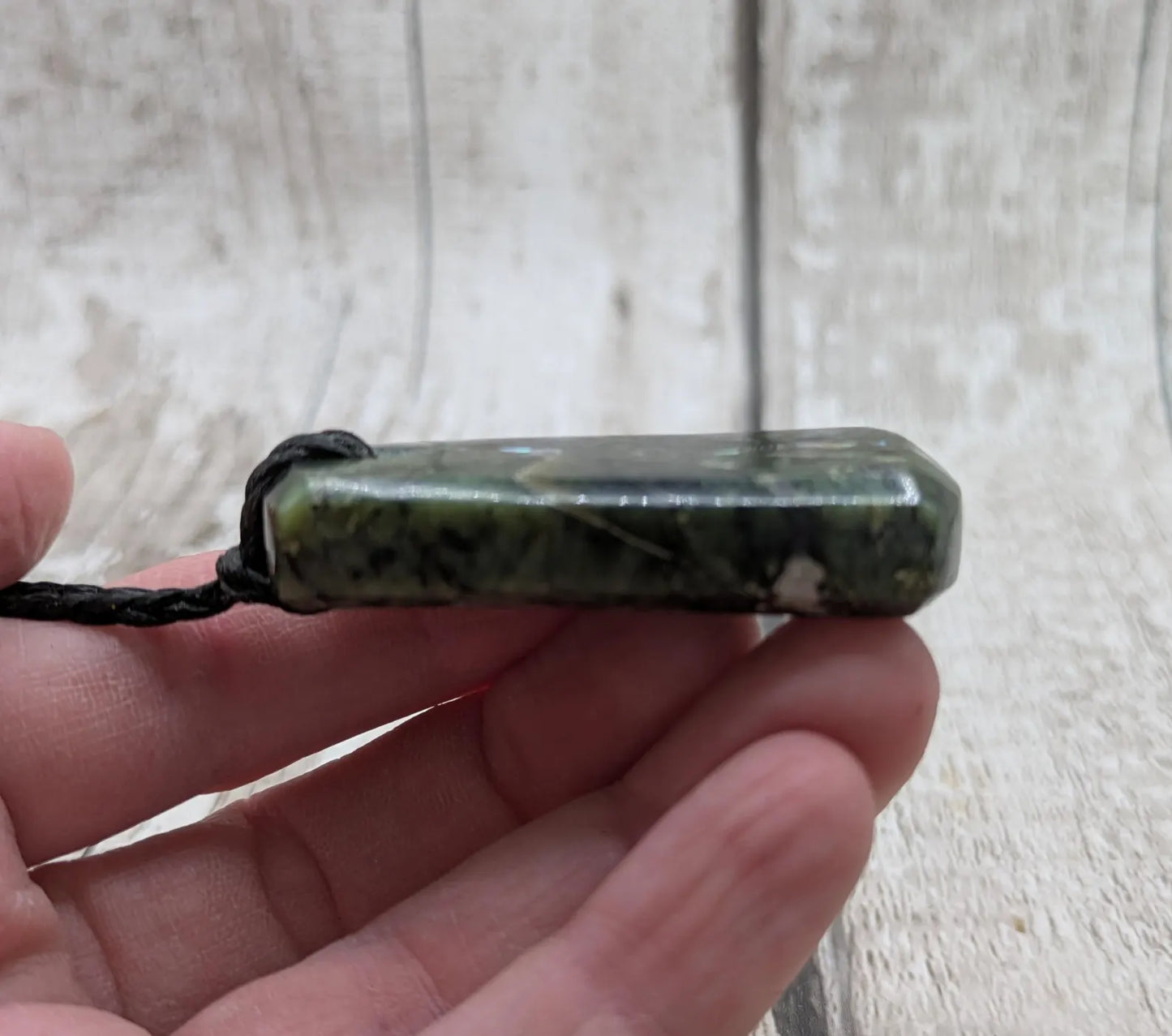 Haast pass serpentine pendant with Pāua shell- handcrafted New Zealand Aotearoa pounamu greenstone carved pendant.