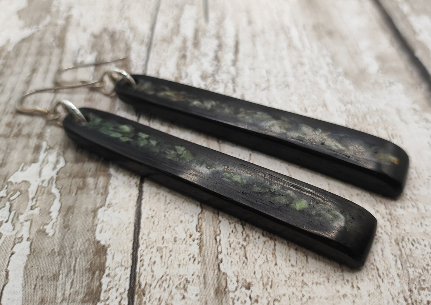 Made to order Fenland bog oak toki earrings with new Zealand pounamu greenstone inlay.