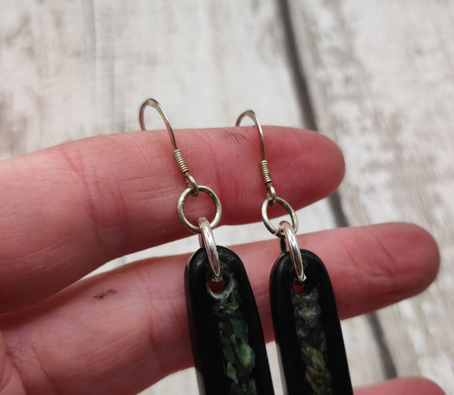 Made to order Fenland bog oak toki earrings with new Zealand pounamu greenstone inlay.