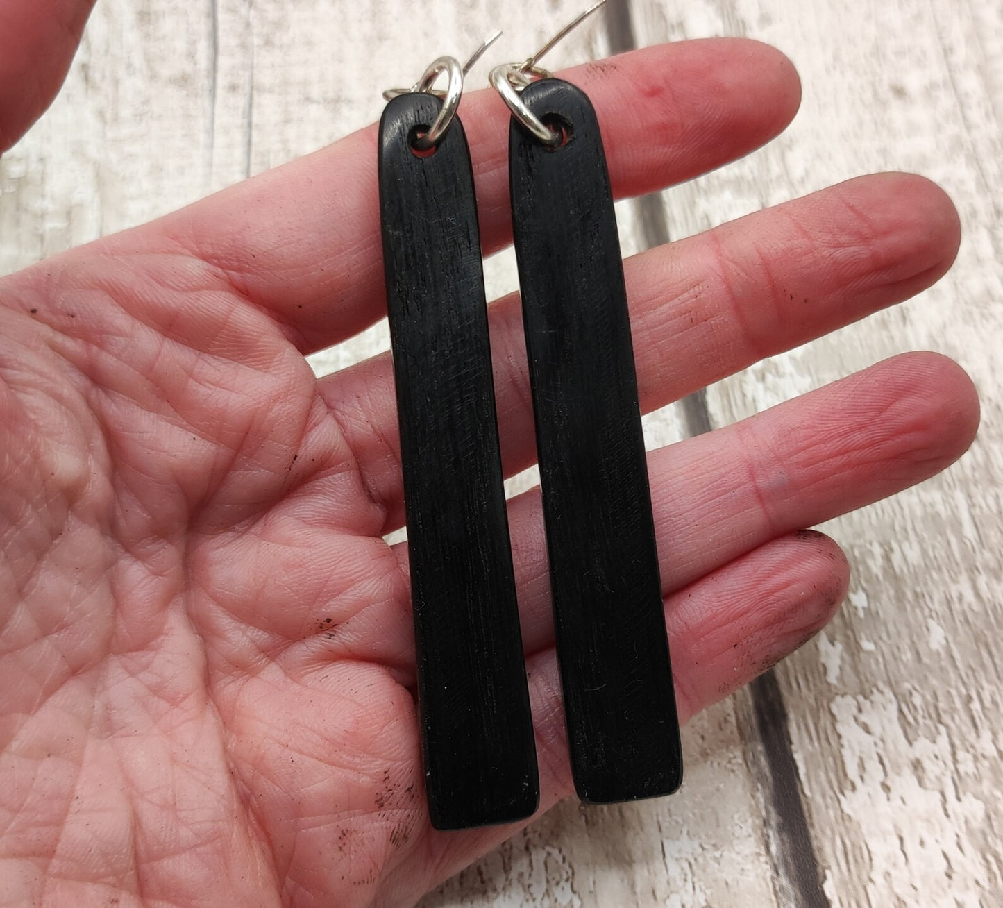Made to order Fenland bog oak toki earrings with new Zealand pounamu greenstone inlay.