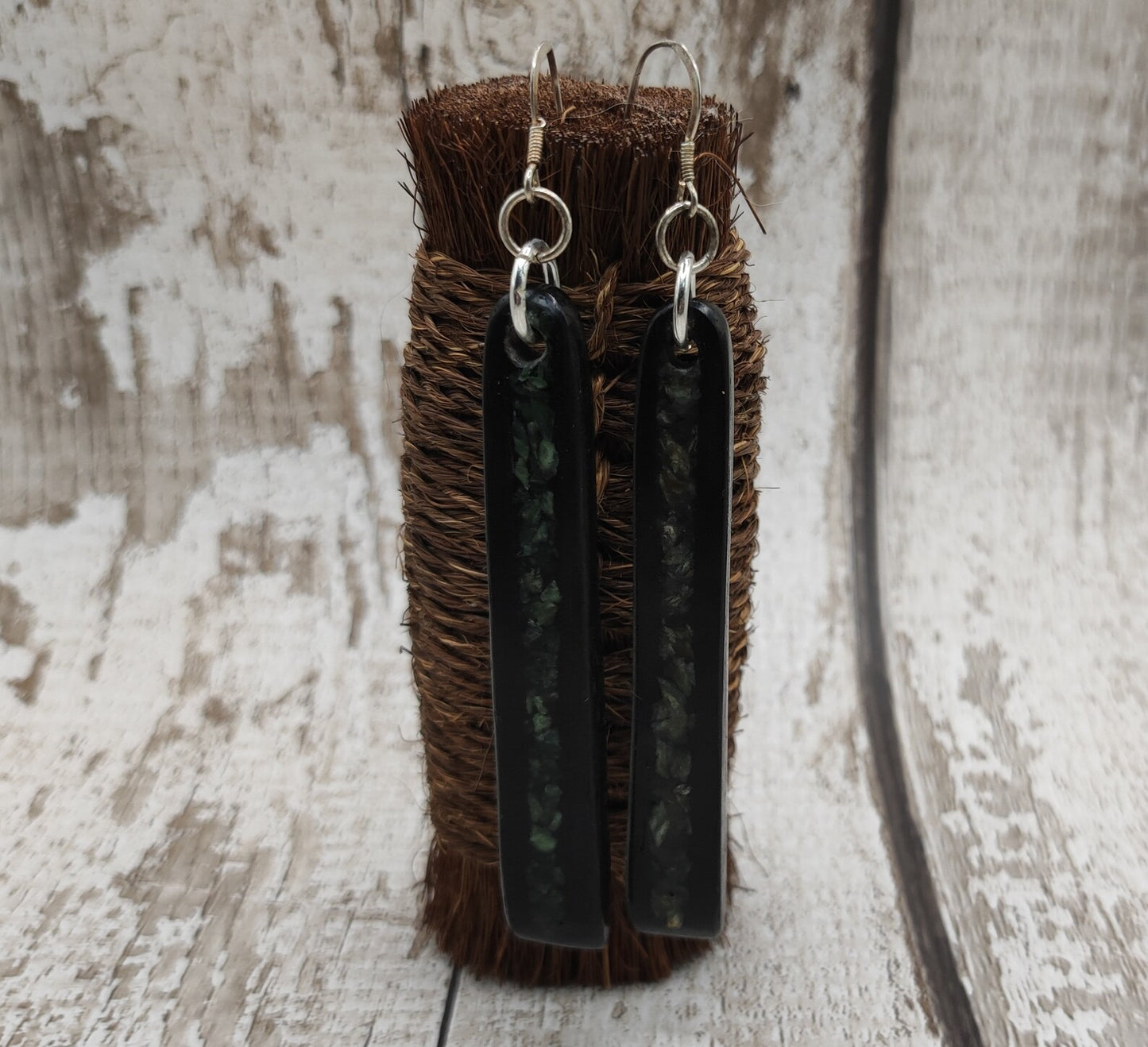 Made to order Fenland bog oak toki earrings with new Zealand pounamu greenstone inlay.