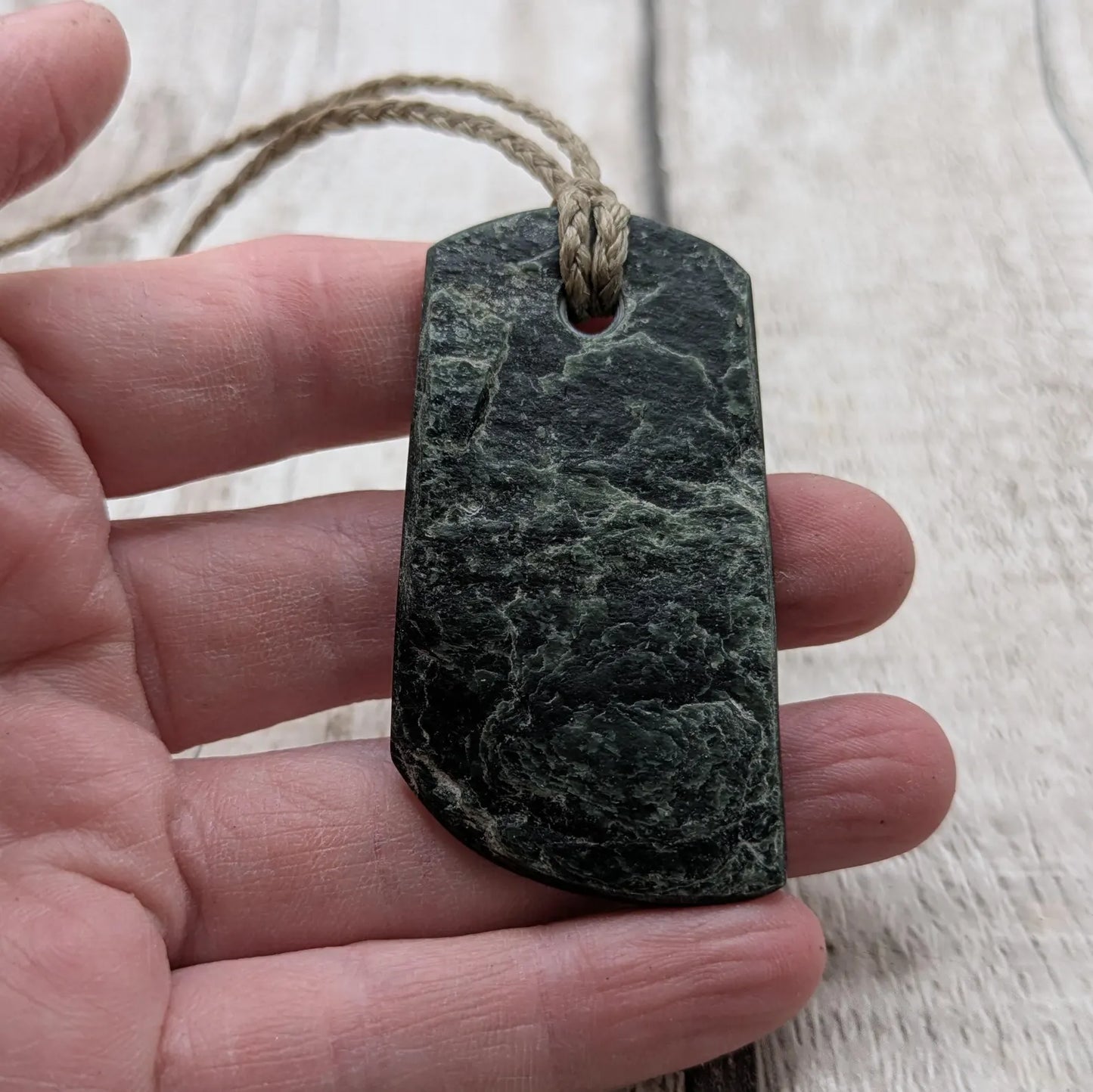 raw serpentine pounamu pendant -natural unpolished New Zealand Aotearoa pebble jewellery.
