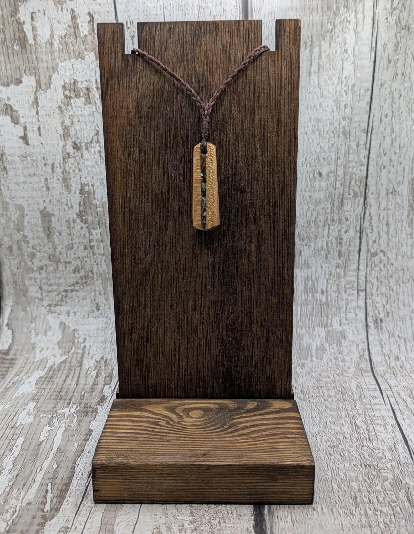 New Zealand swamp kauri roimata pendant with rainbow Pāua.