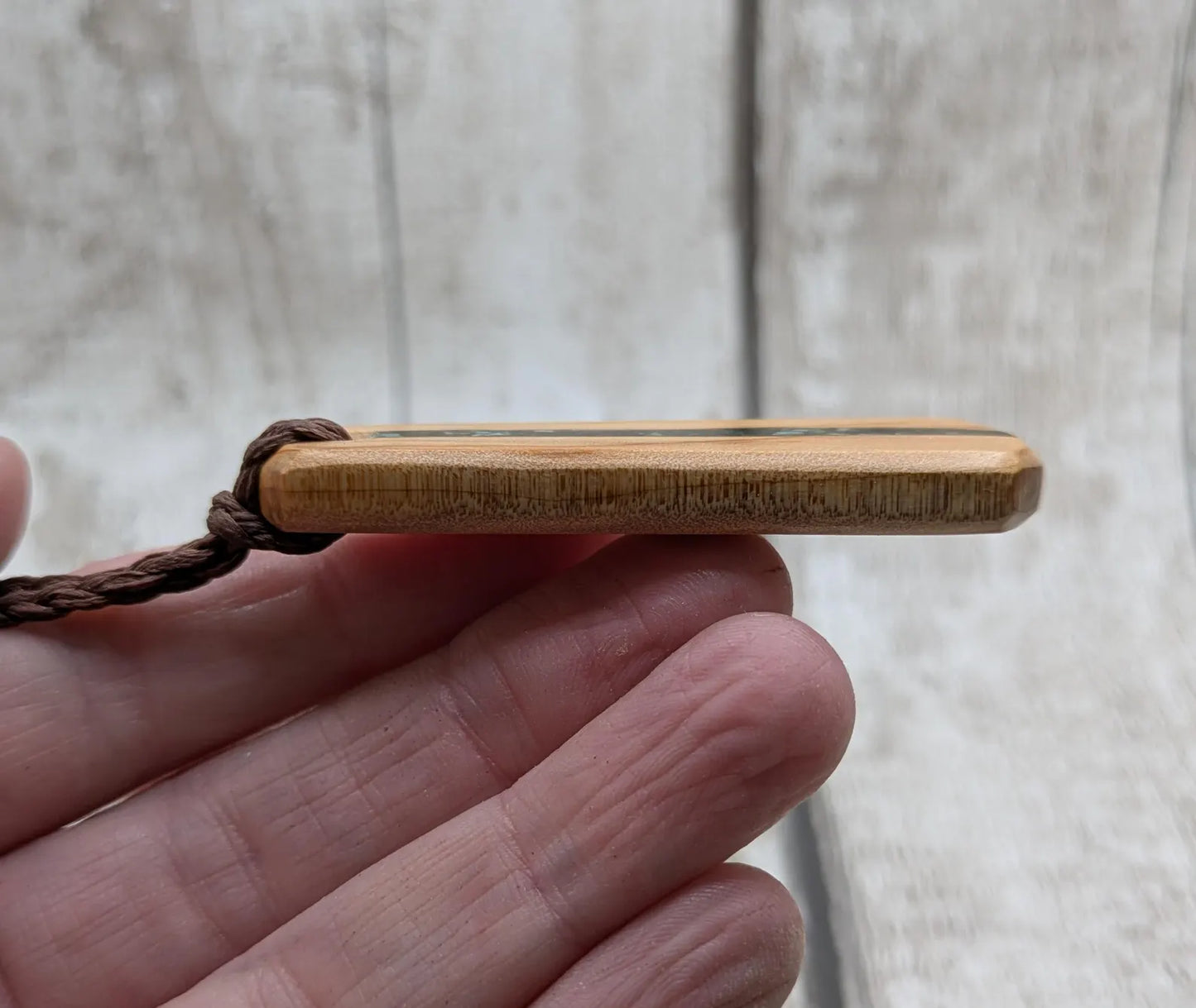 Made to order Yew wood toki style pendant with mixed pounamu greenstone inlay - Handcrafted British jewellery, Māori inspired nature talisman.