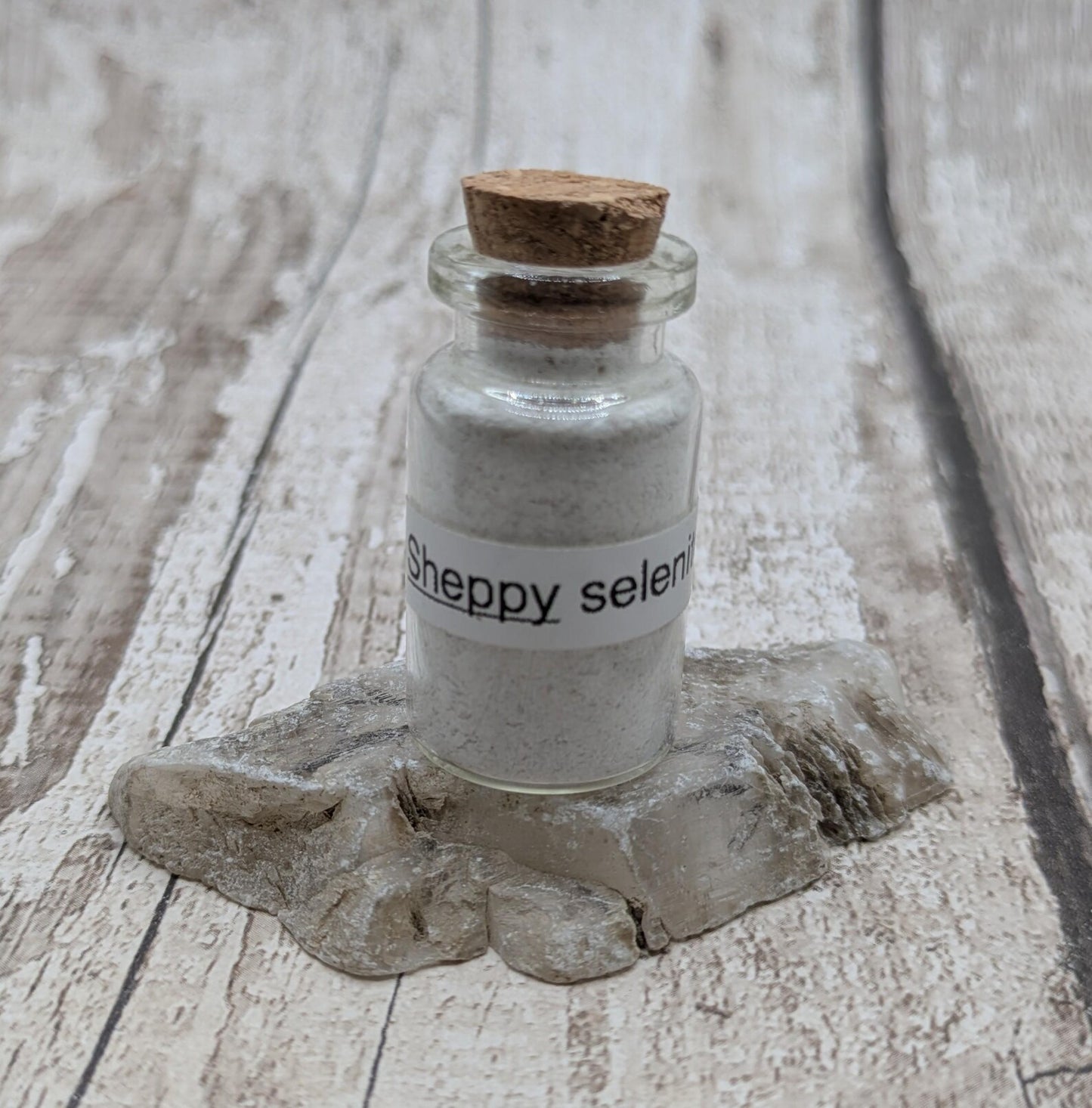 Unrefined powdered sheppy selenite paint pigment.