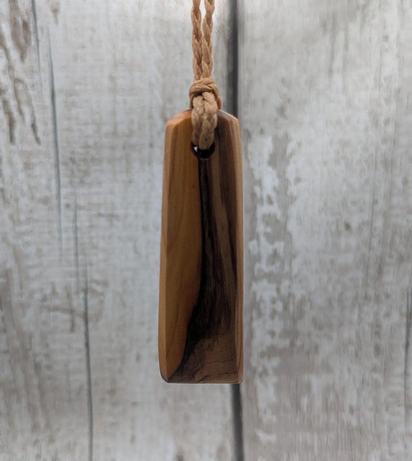 yew wood Hei toki adze style pendant - Handcrafted British jewellery, Māori inspired nature talisman, eco friendly.