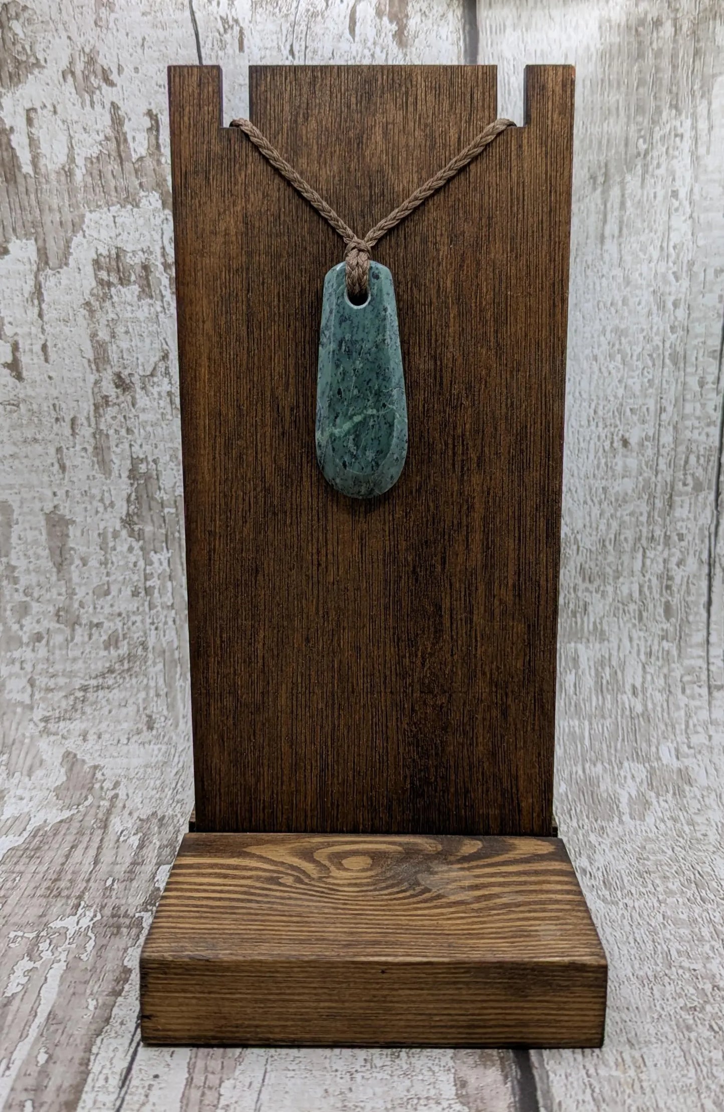 New Zealand Pounamu jade Hei Toki adze styled pendant.
