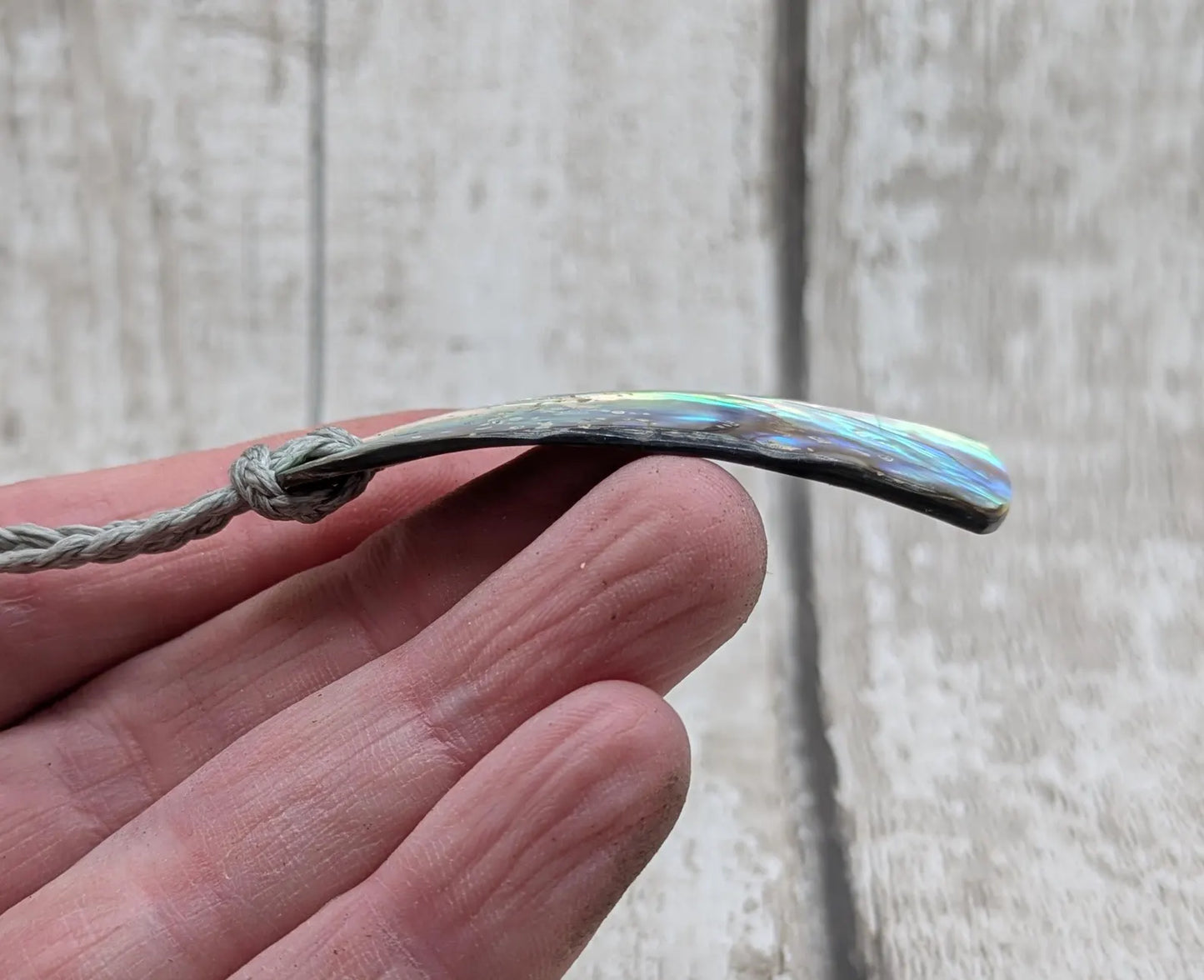 New Zealand Pāua shell pendant.