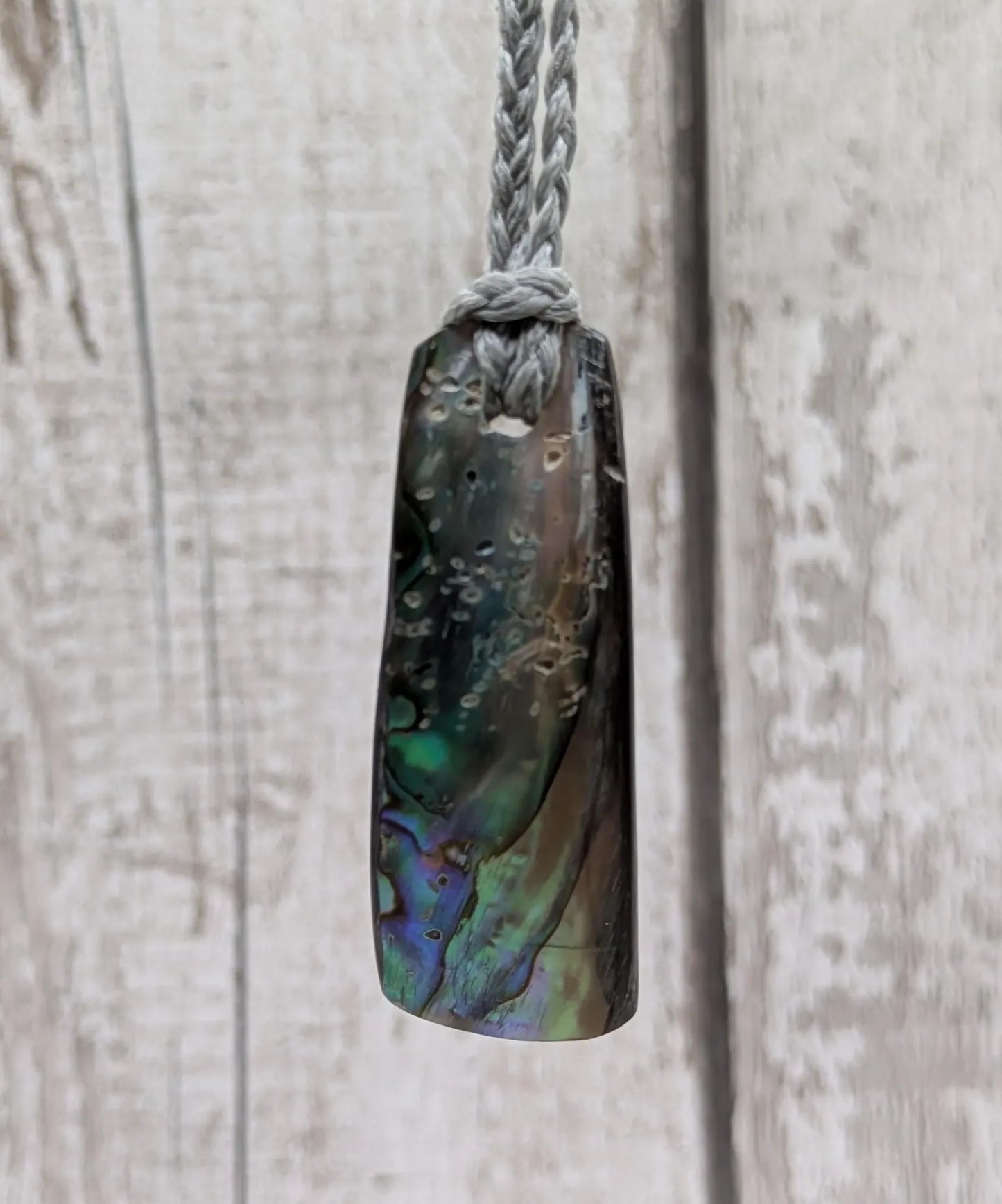 New Zealand Pāua shell pendant.