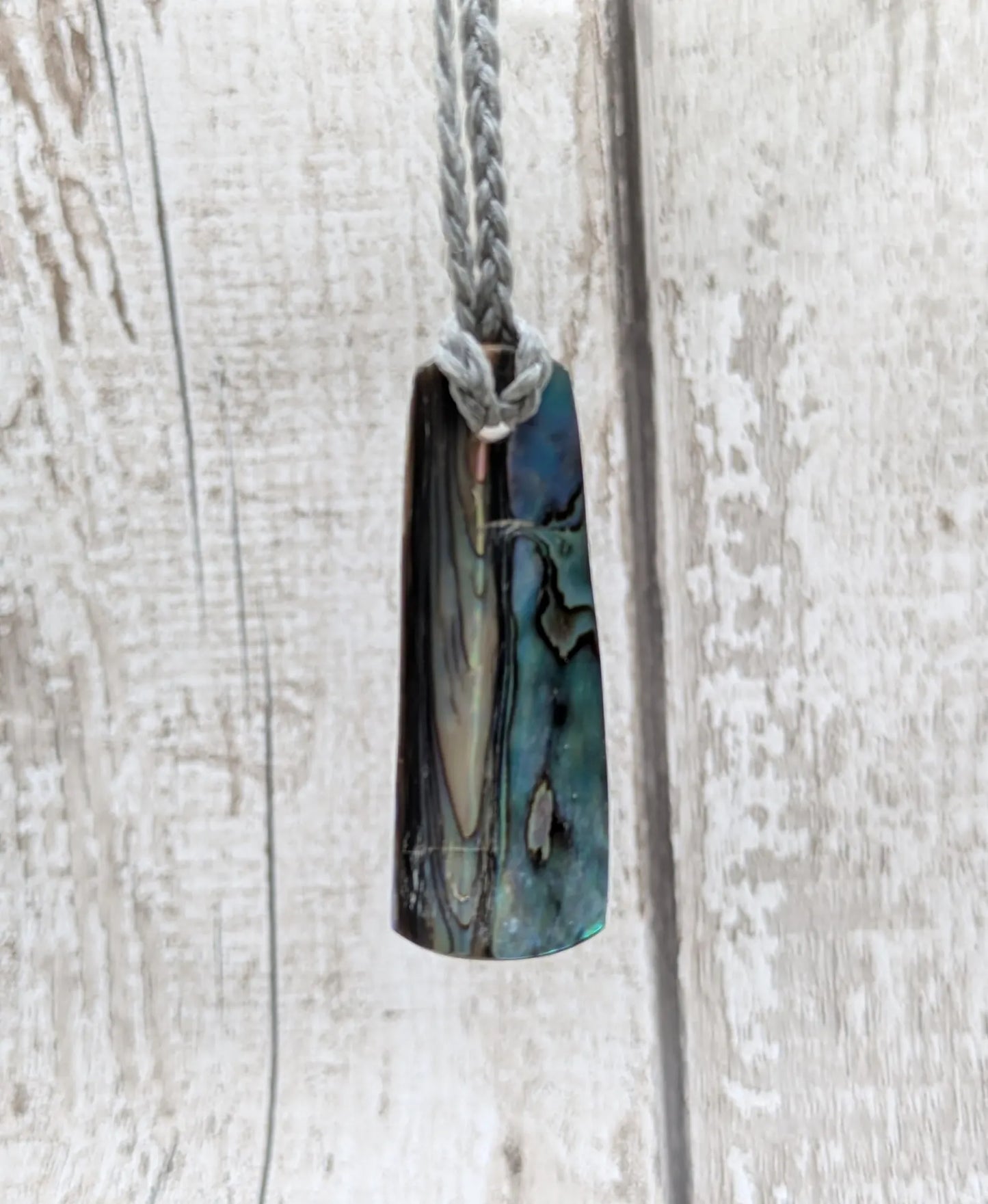 New Zealand Pāua shell pendant.