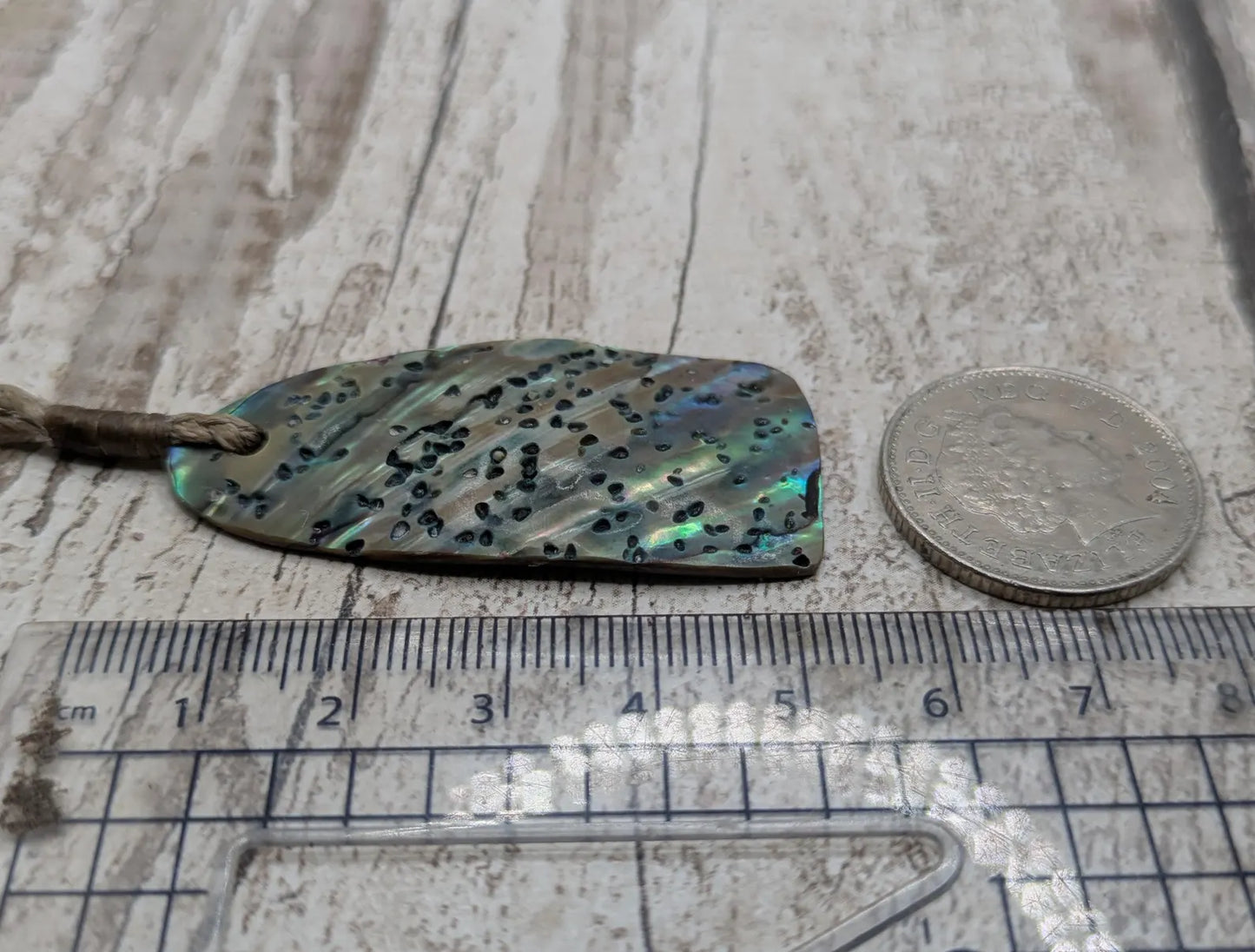New Zealand Rainbow pāua shell pendant - iridescent abalone necklace, trapezoid shape, oceanic gift, hand crafted jewellery.