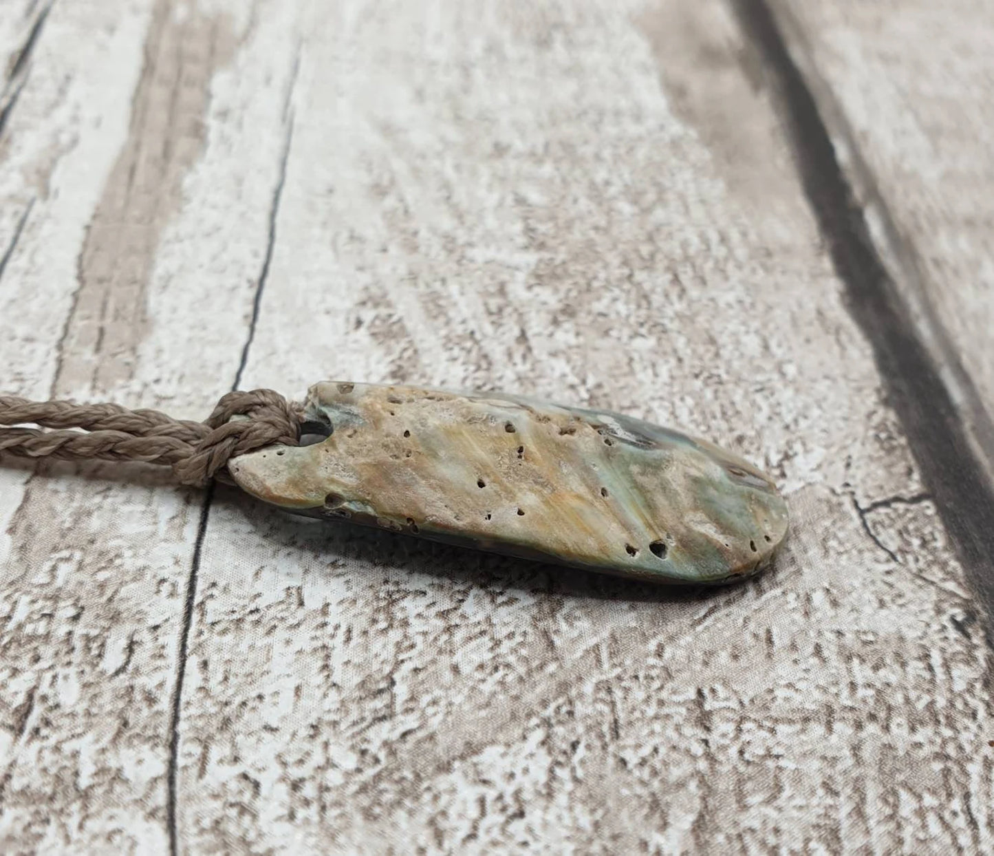 New Zealand rainbow paua abalone shell tumbled offcut unisex pendant.