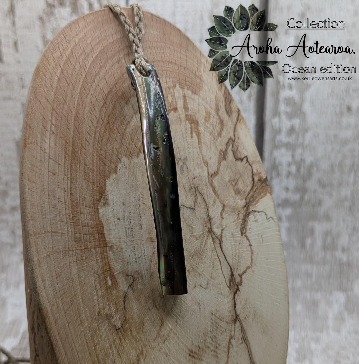 new Zealand rainbow pāua abalone shell lip rim pendant.