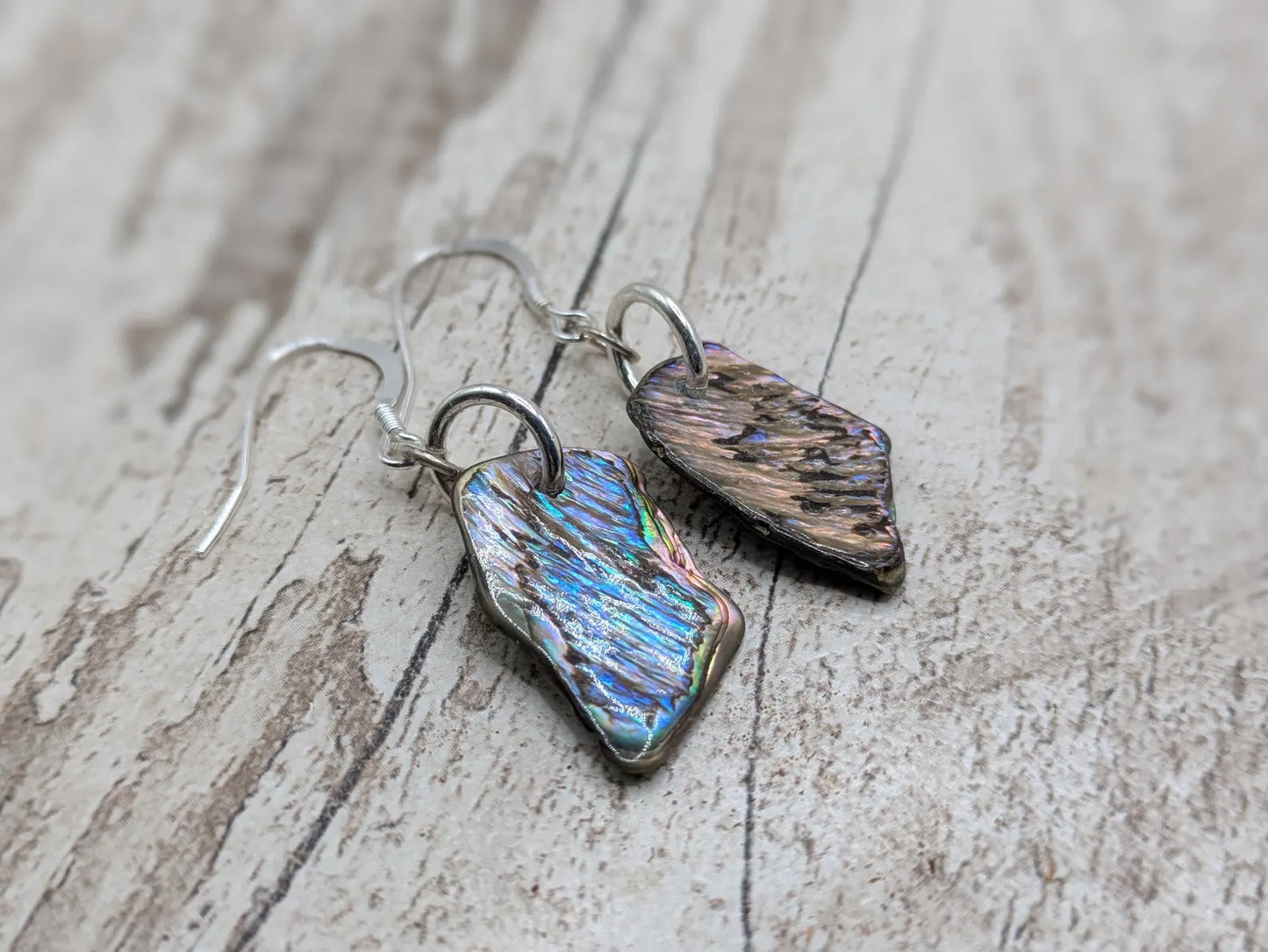 New Zealand Pāua Shell Earrings – Rainbow Abalone Free-Form Drops on Sterling Silver Hooks | Ocean Energy Jewellery.