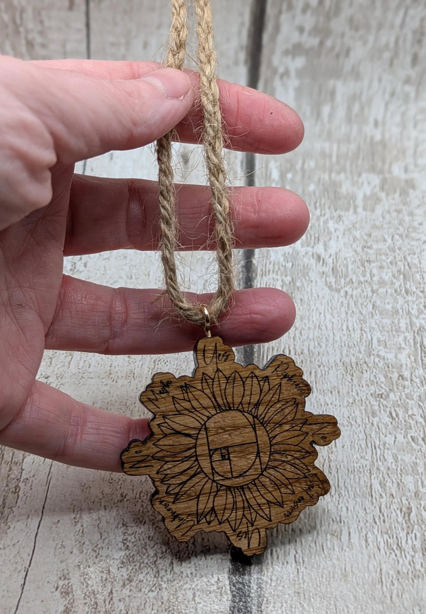 Tiny travel sized sunflower pendulum board, laser printed.