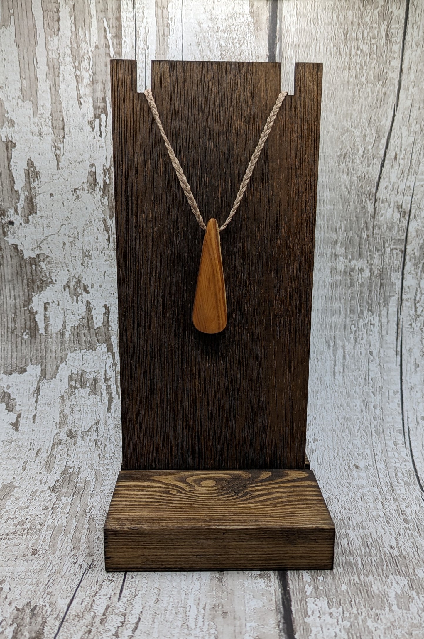 Yew wood roimata teardrop pendant.