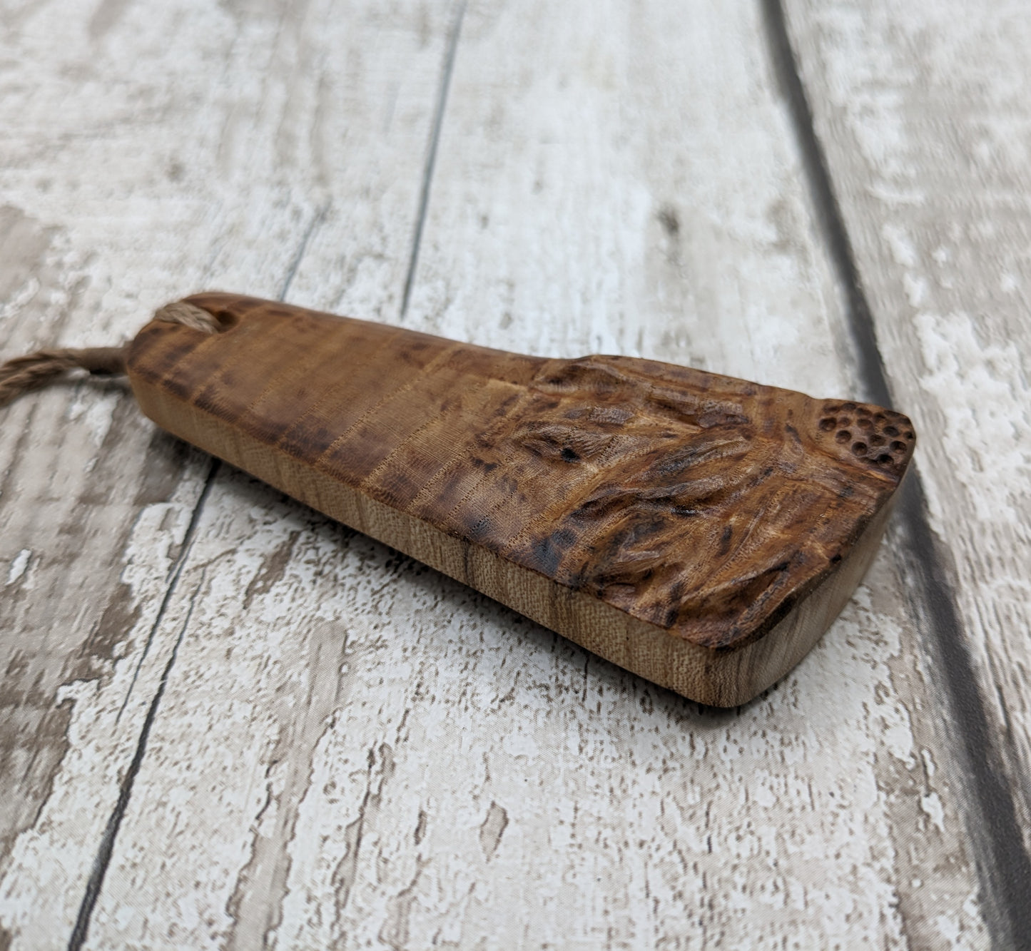 Birch wood sunflower toki styled pendant.