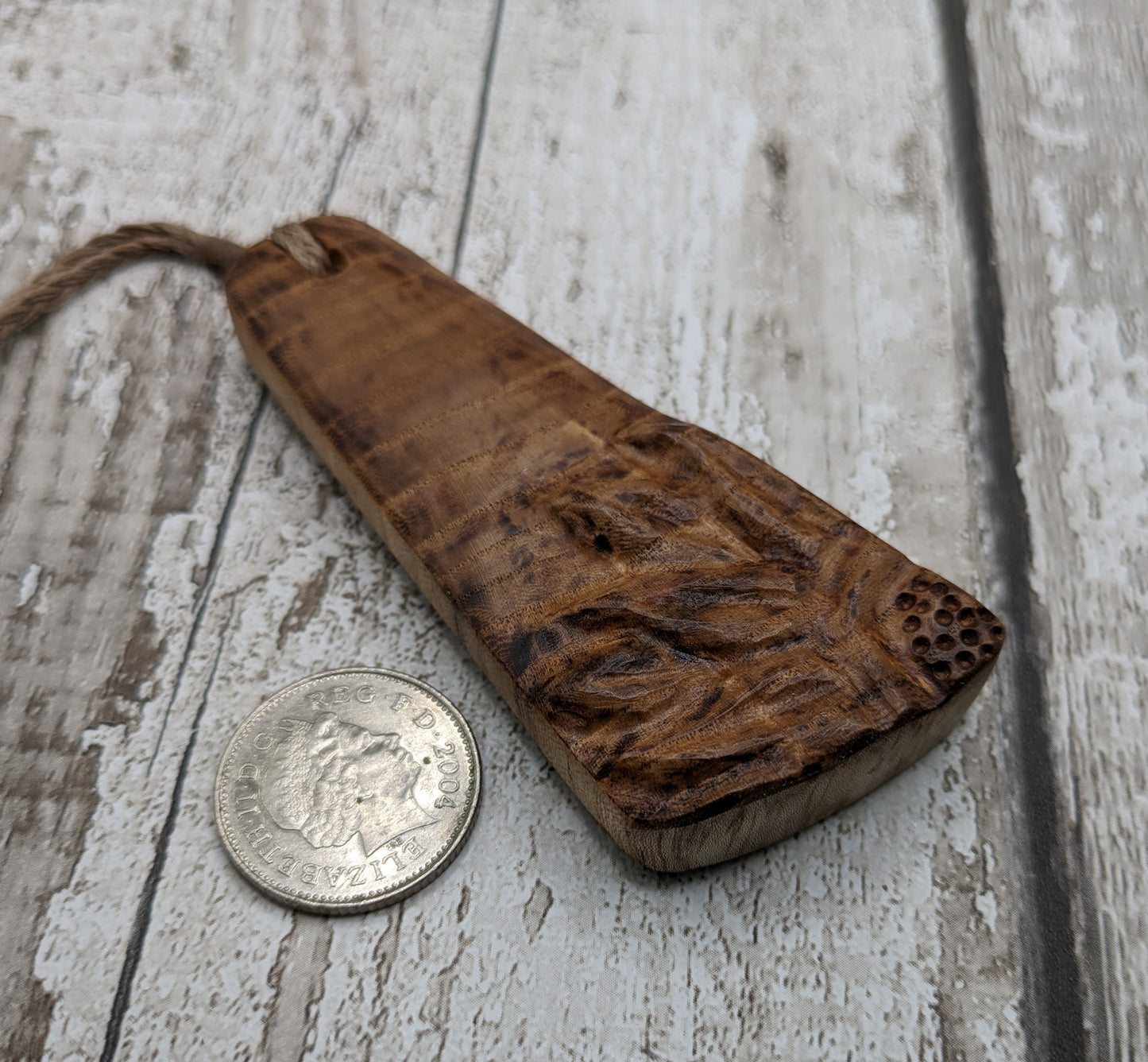 Birch wood sunflower toki styled pendant.