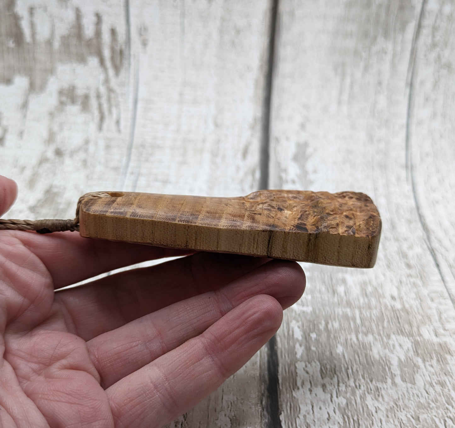 Birch wood sunflower toki styled pendant.