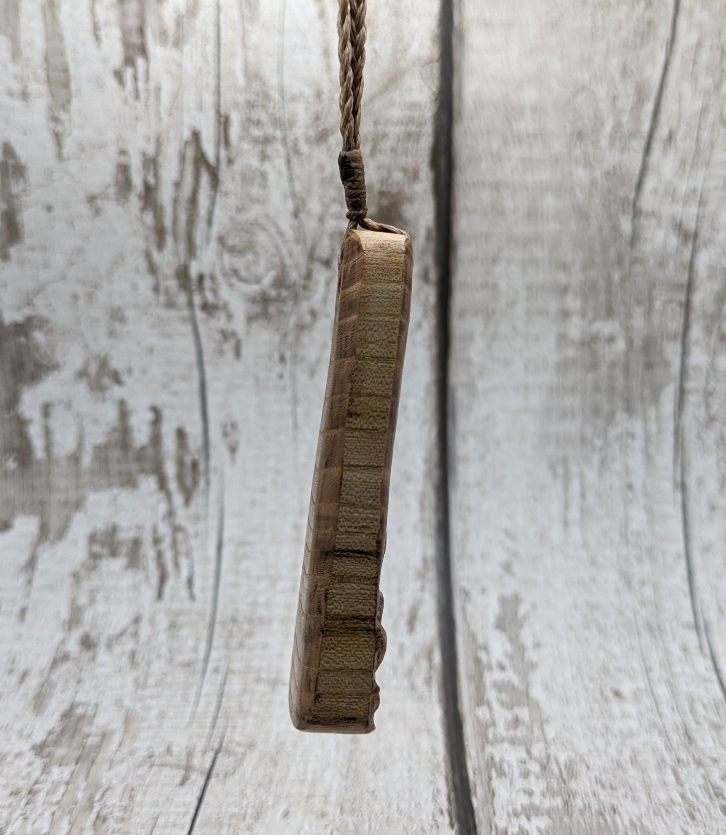 Birch wood sunflower toki styled pendant.