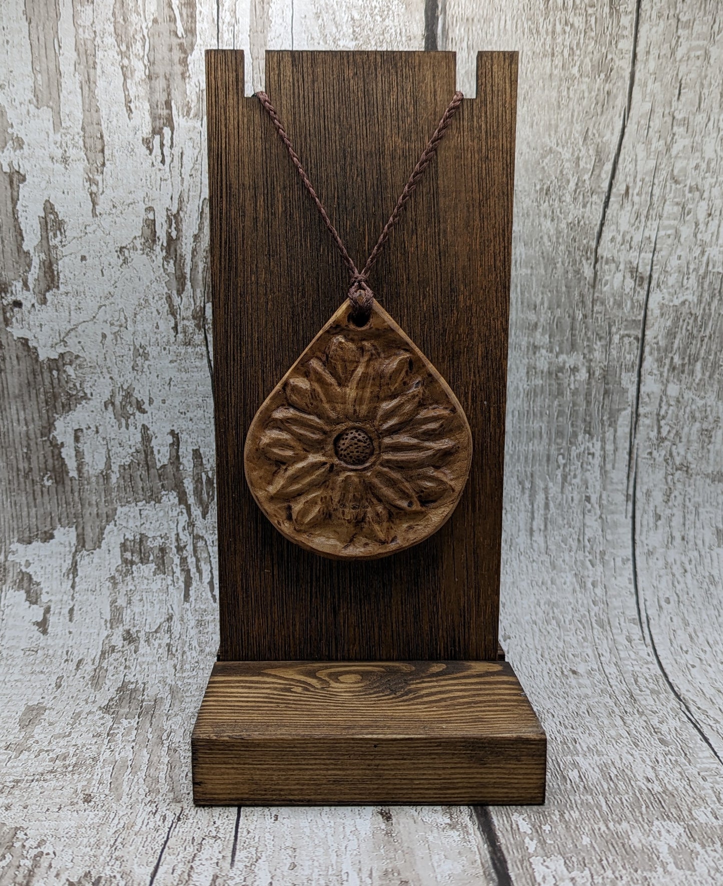 Birch wood sunflower medallion pendant.