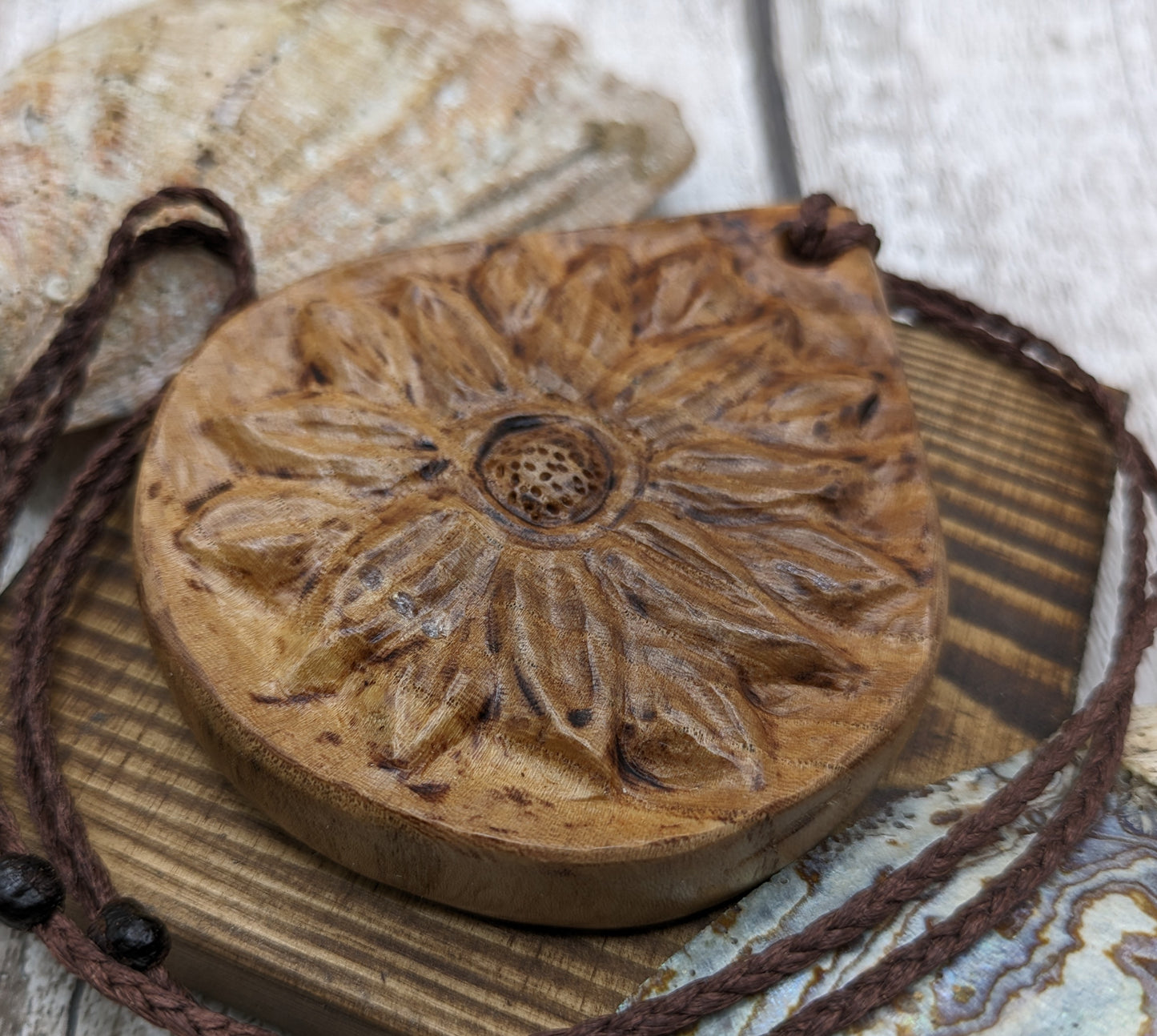 Birch wood sunflower medallion pendant.