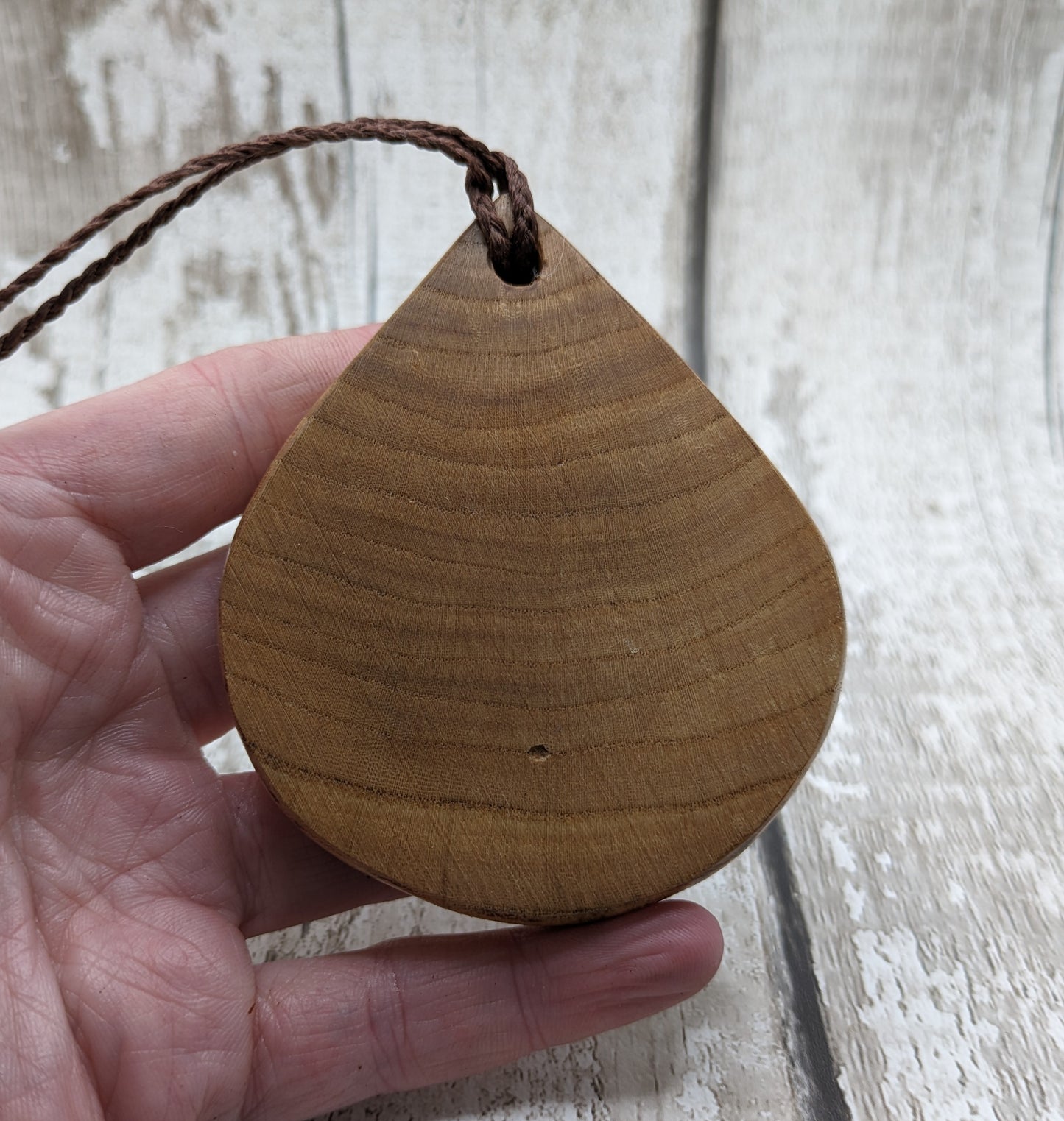 Birch wood sunflower medallion pendant.