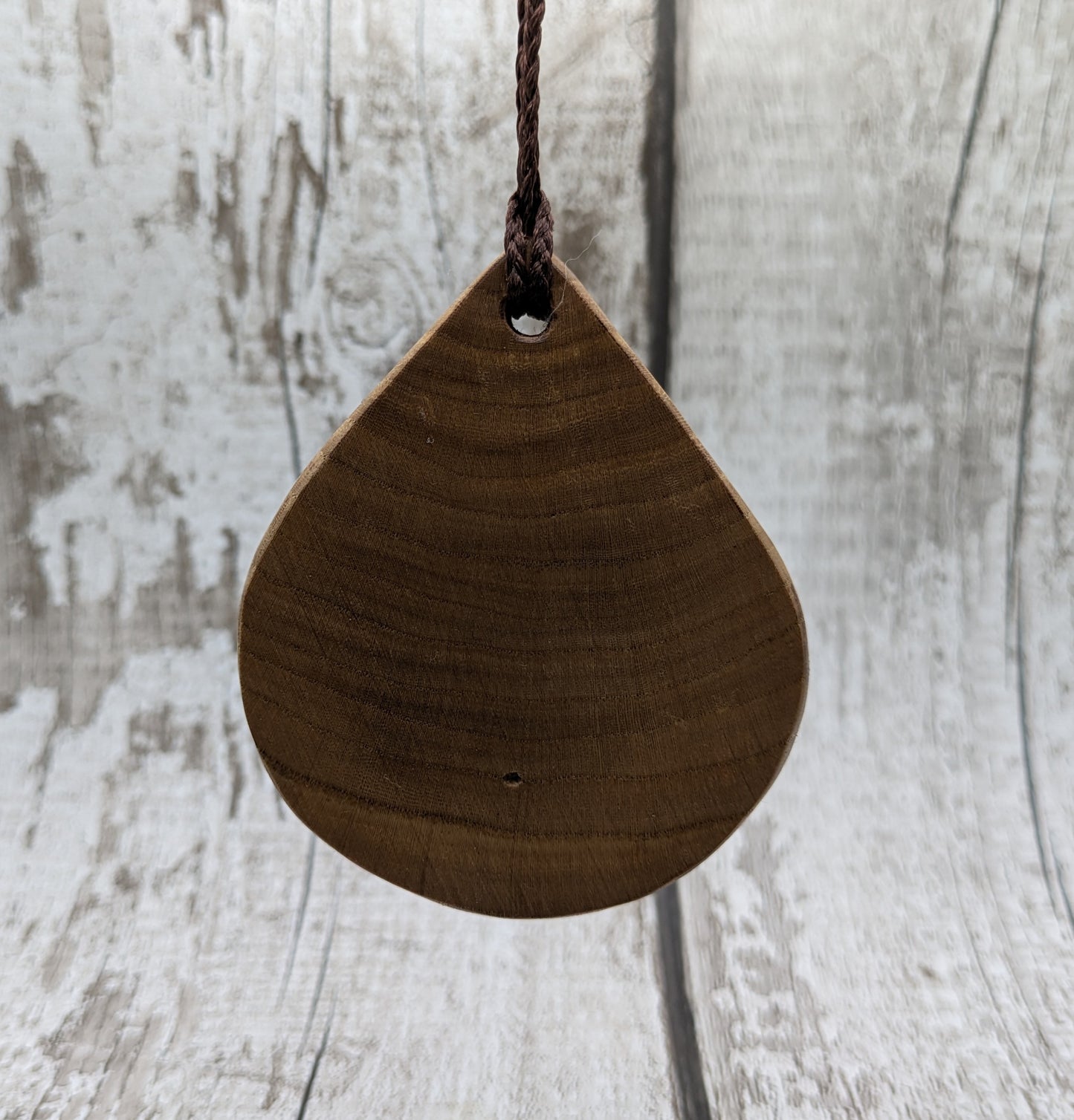Birch wood sunflower medallion pendant.