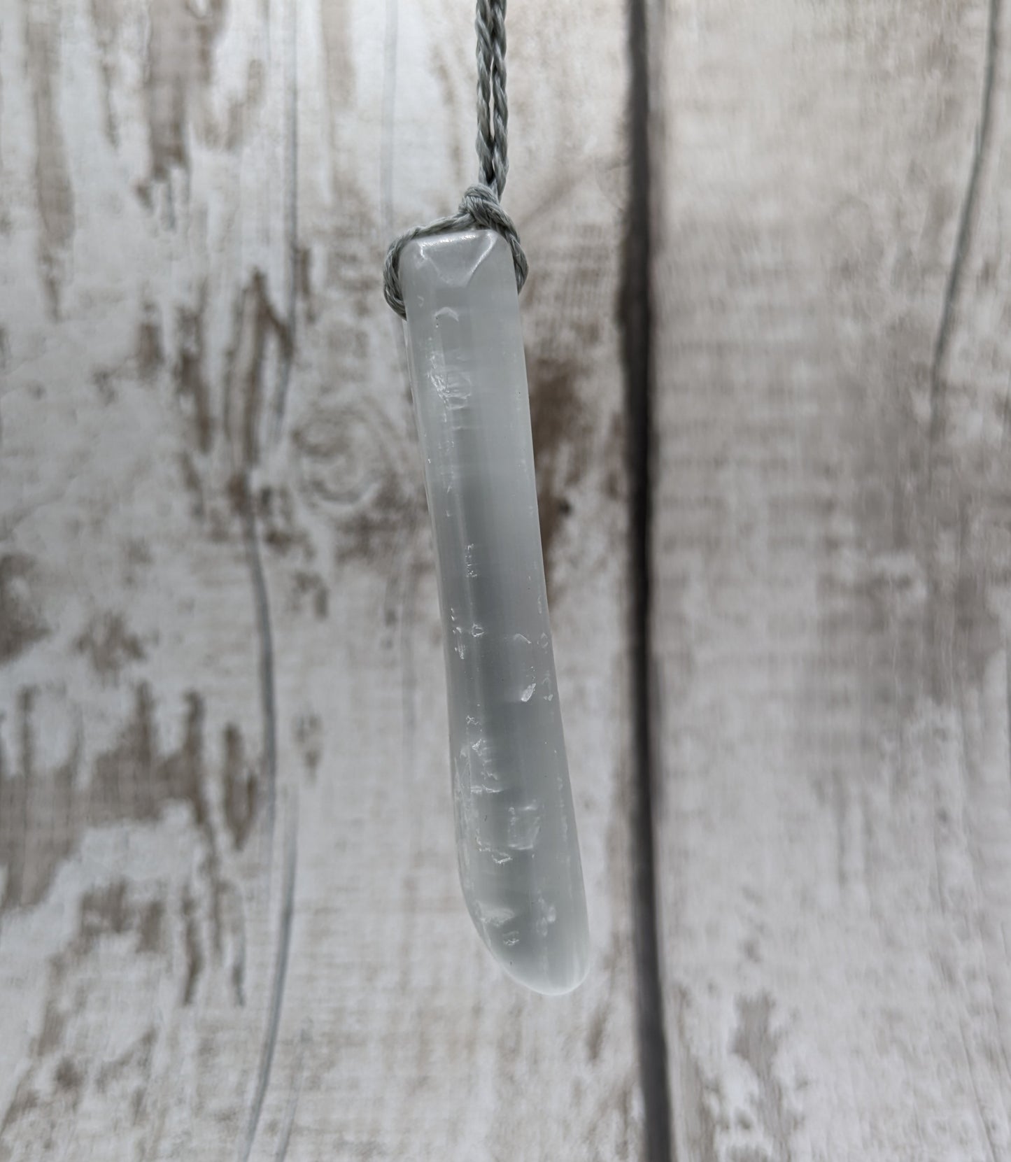 Selenite satin spar toki inspired pendant.