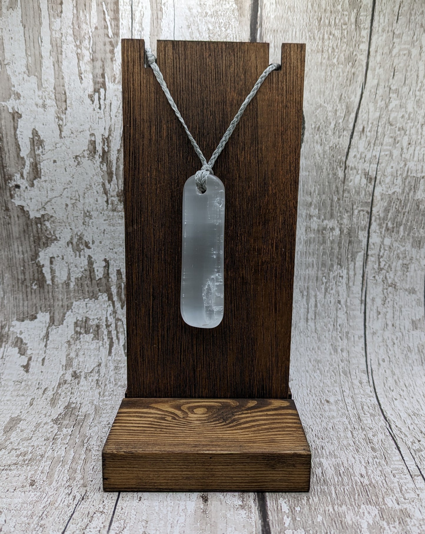 Selenite satin spar toki inspired pendant.