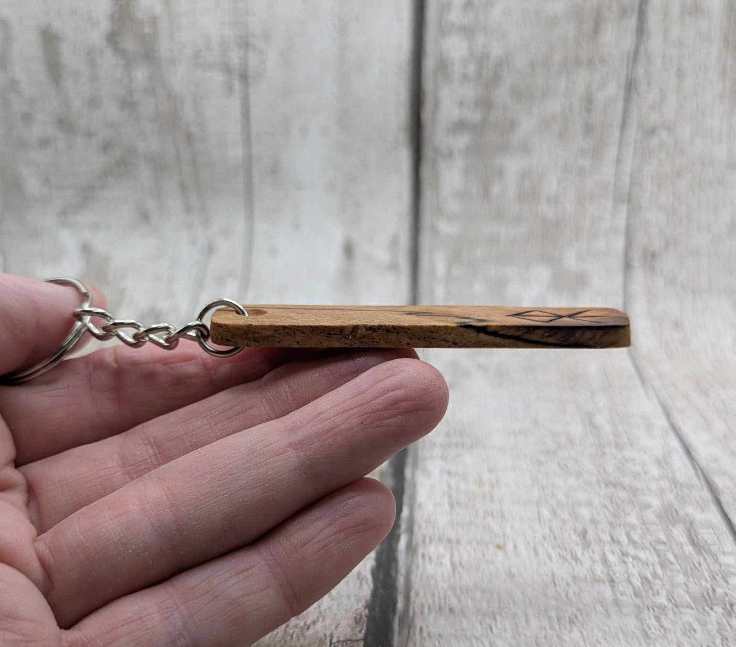Spalted beech protection bind run keyrings.