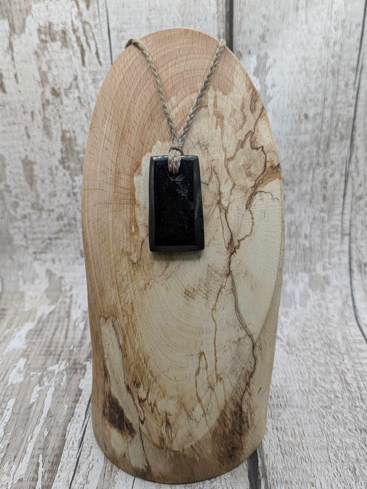 Sea coal rectangular pendant.