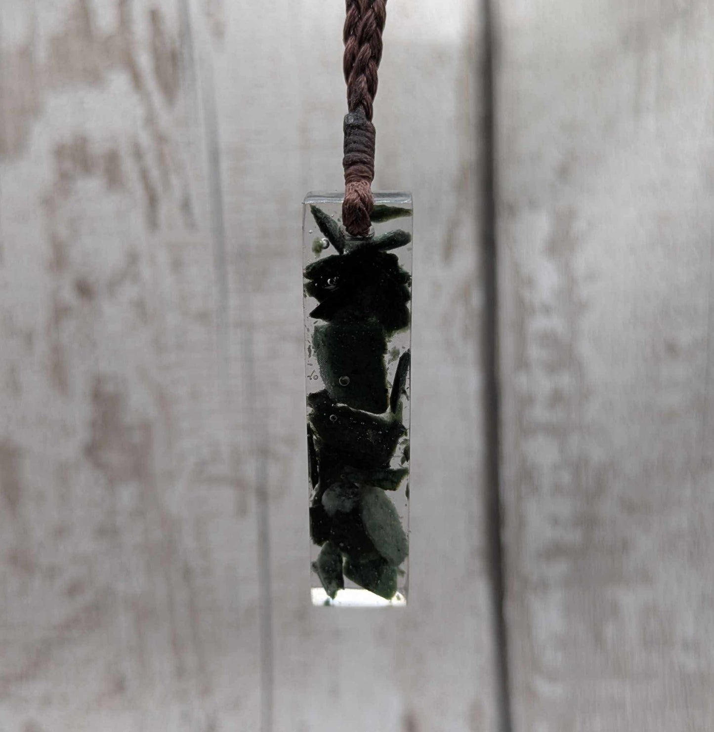 New Zealand mixed Pounamu chip pendant in UV resin.
